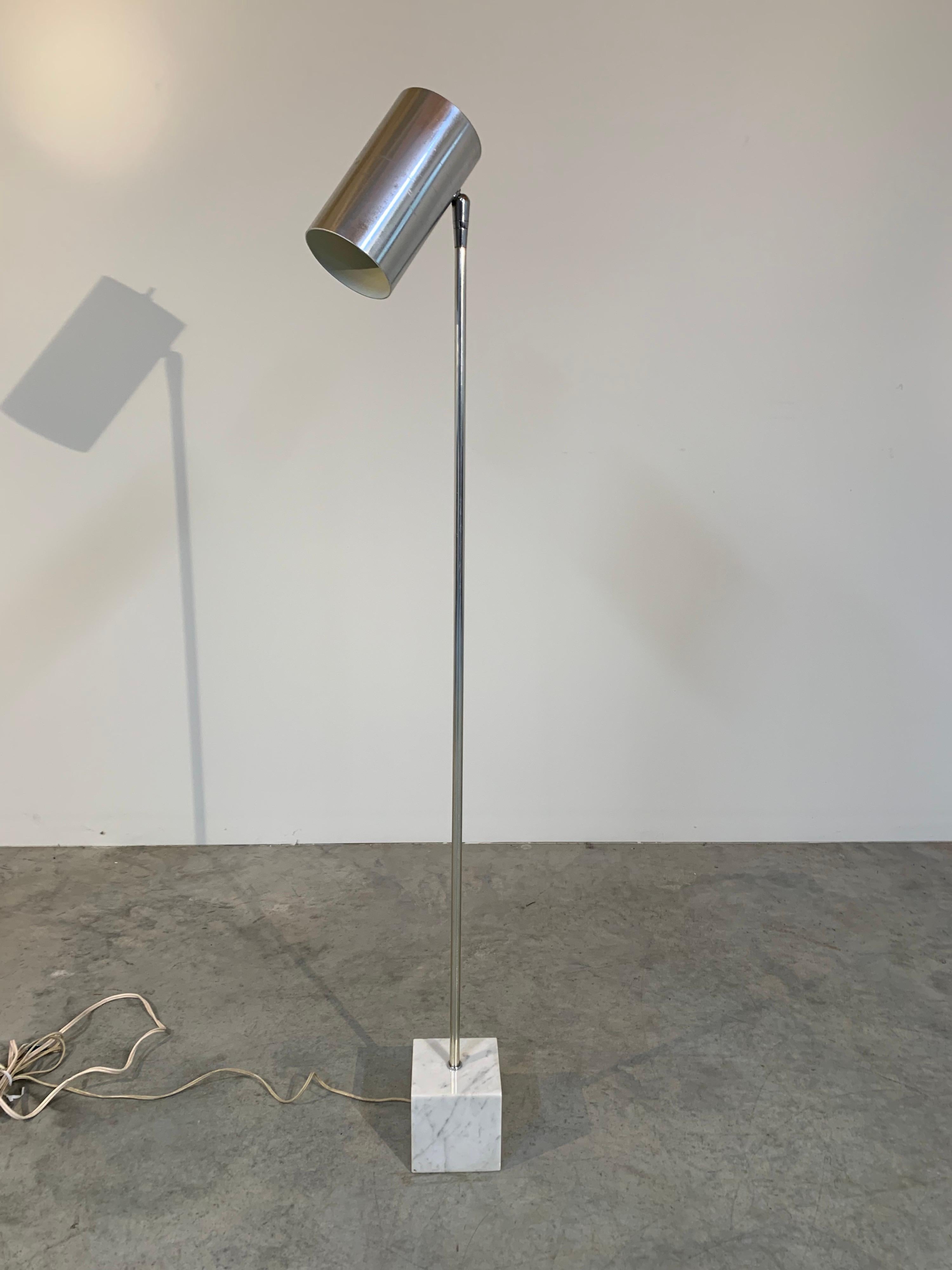Vintage floor lamp having pivoting aluminum cylindrical shade with cubes marble base designed by Robert Sonneman for Kovacs circa 1960. 
2 tiny chips on marble and some horizontal rub lines on shade as shown in the images provided. 
 Original