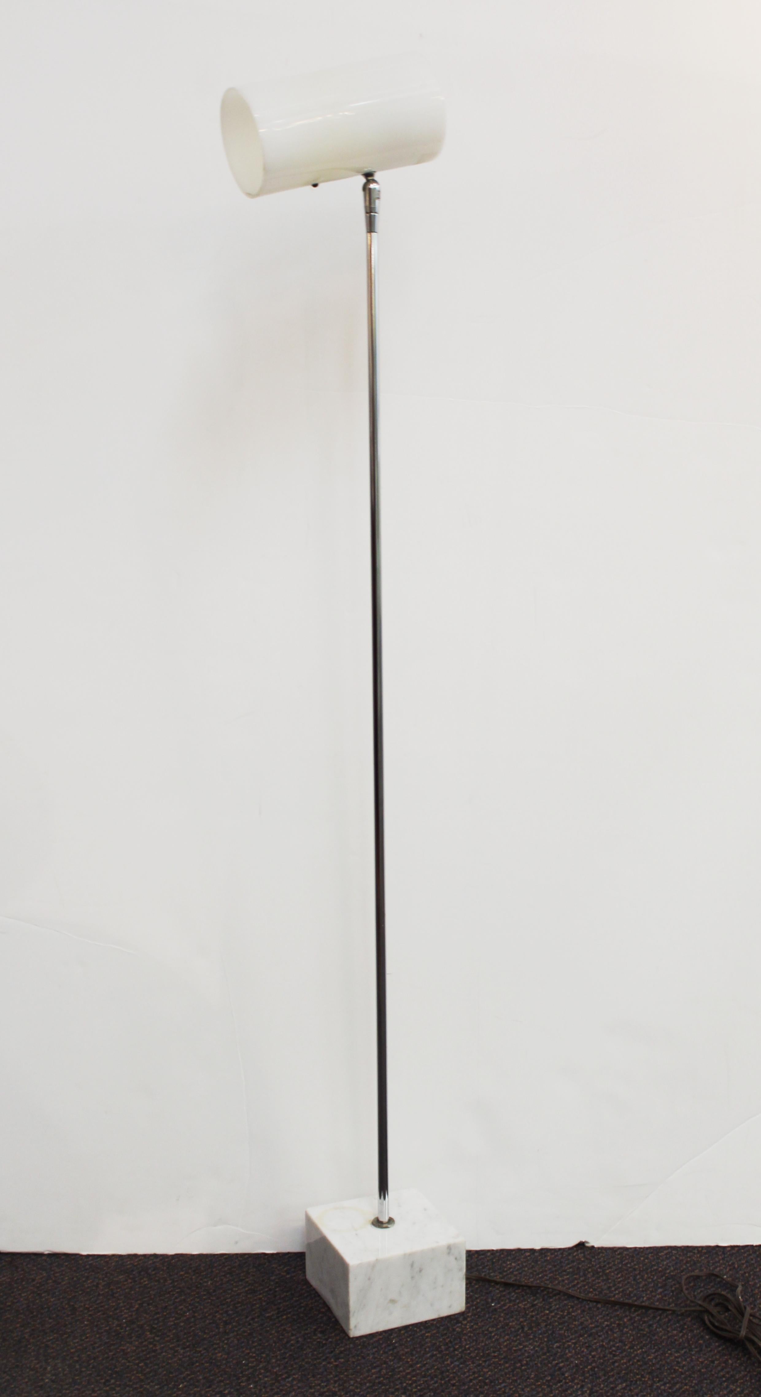Modern floor lamp designed by Robert Sonneman for Kovacs, with white marble base. Some heat damage to the inside of the composite material shade, but in overall great vintage condition.