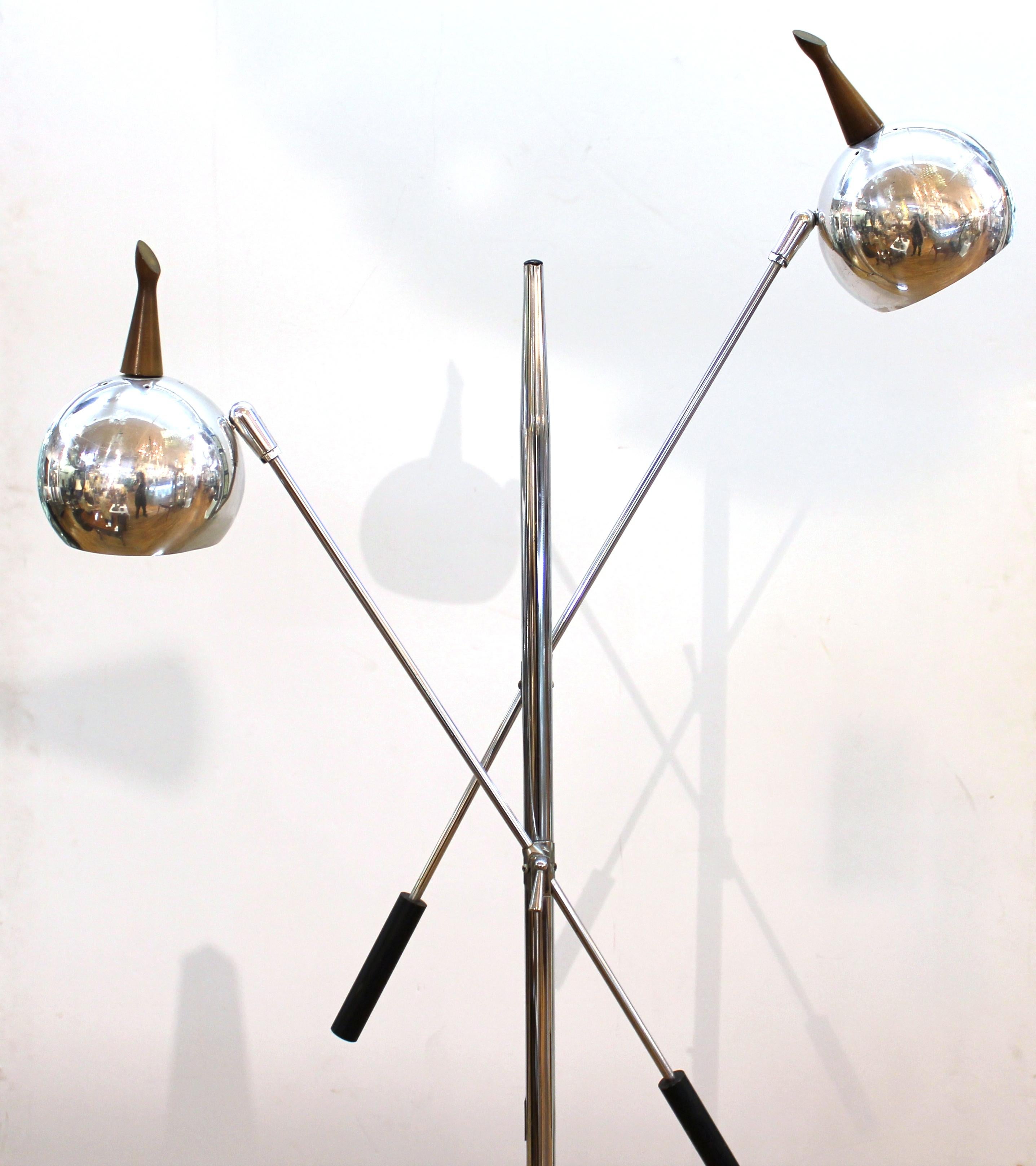 Robert Sonneman American Mid-Century space age 'Orbiter' floor lamp in chrome with two arms and unusual carved wooden handles to each of the orb shades.