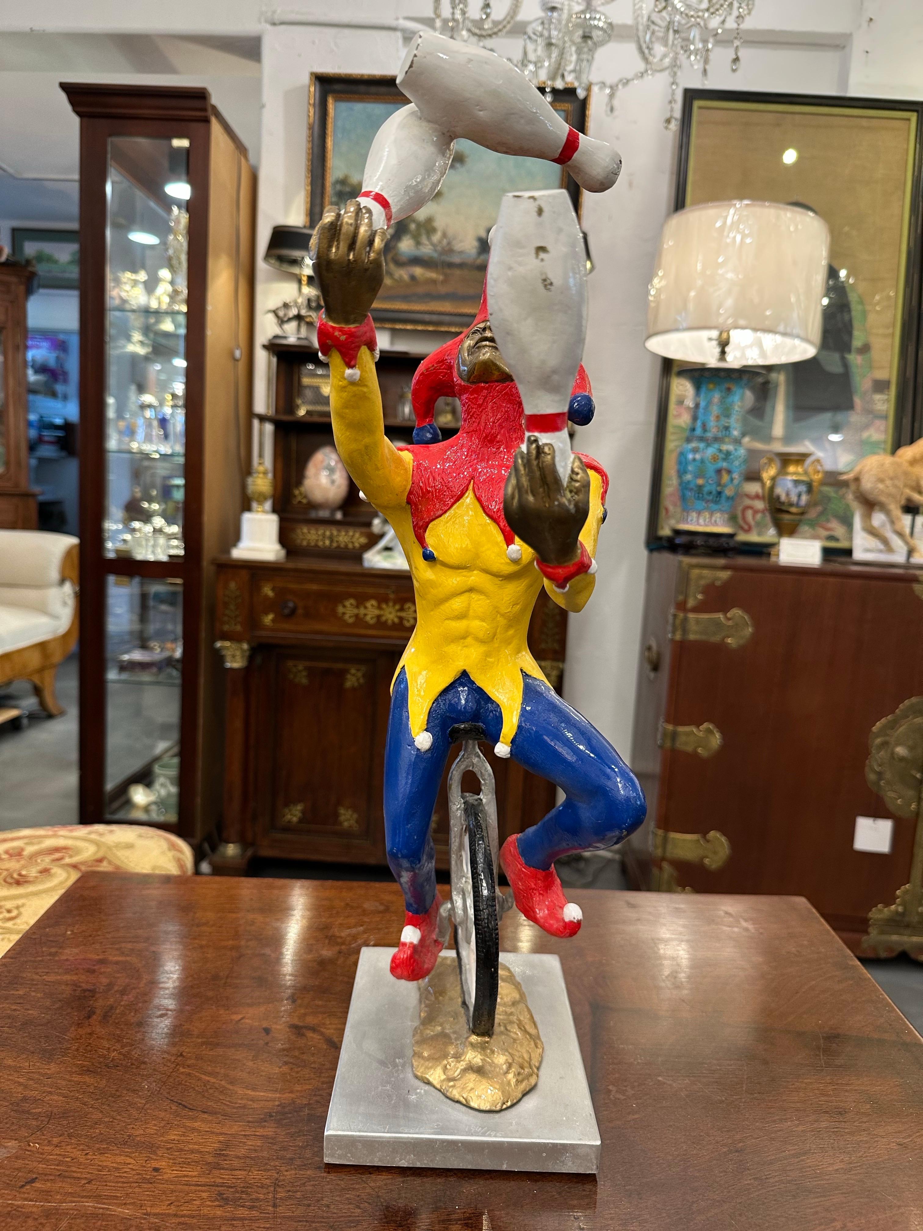 Polychromed Robert St Croix Polychrome Bronze of a Jester Juggling on a Unicycle For Sale