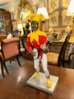 Robert St Croix Polychrome Bronze of a Jester Playing a Banjo