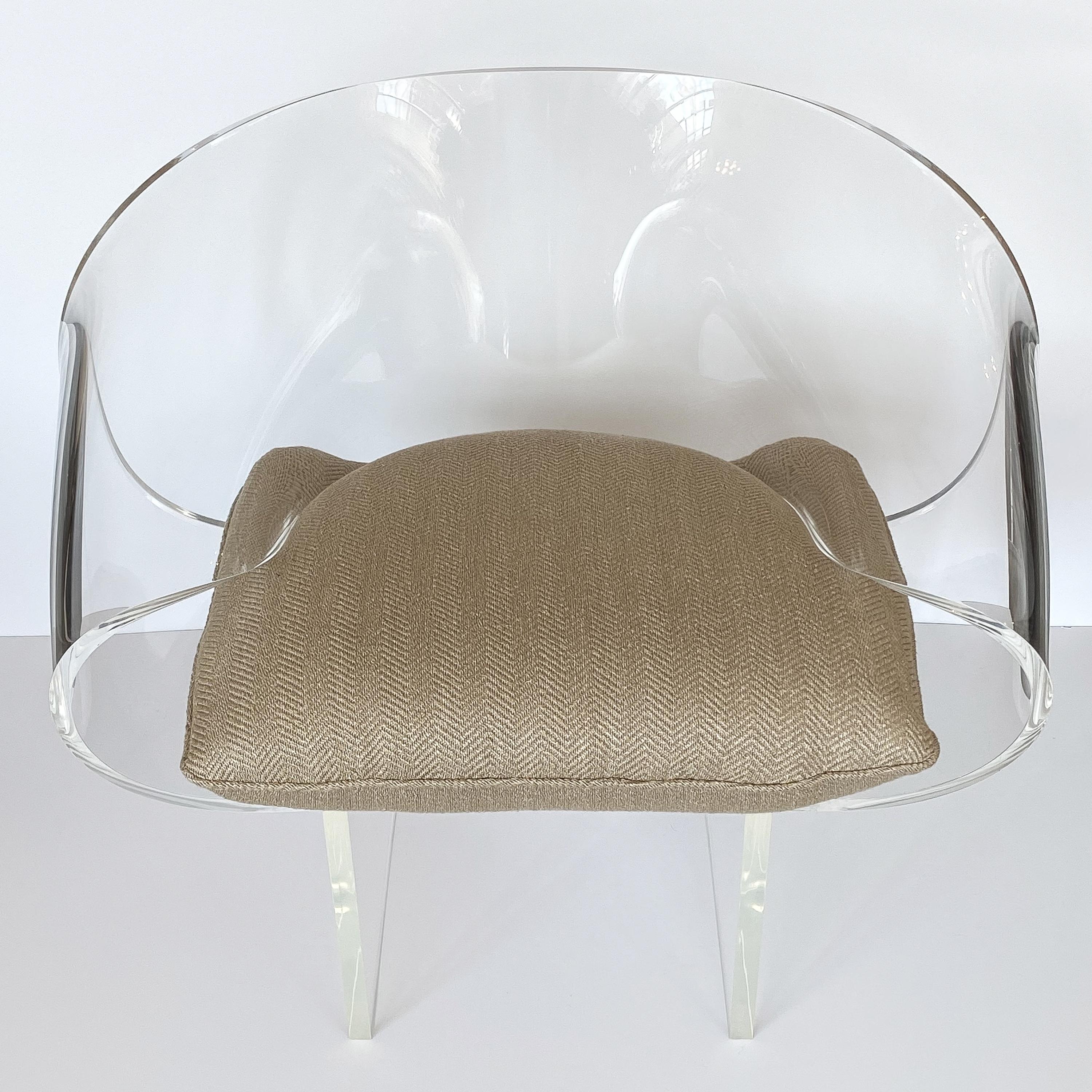 Stunning sculptural Lucite ribbon lounge chair by Robert Van Horn, circa 1970s. This signed all original example is constructed of bent / molded 0.75” thick clear Lucite. Loose seat cushion can be easily recovered or re-imagined in your own choice
