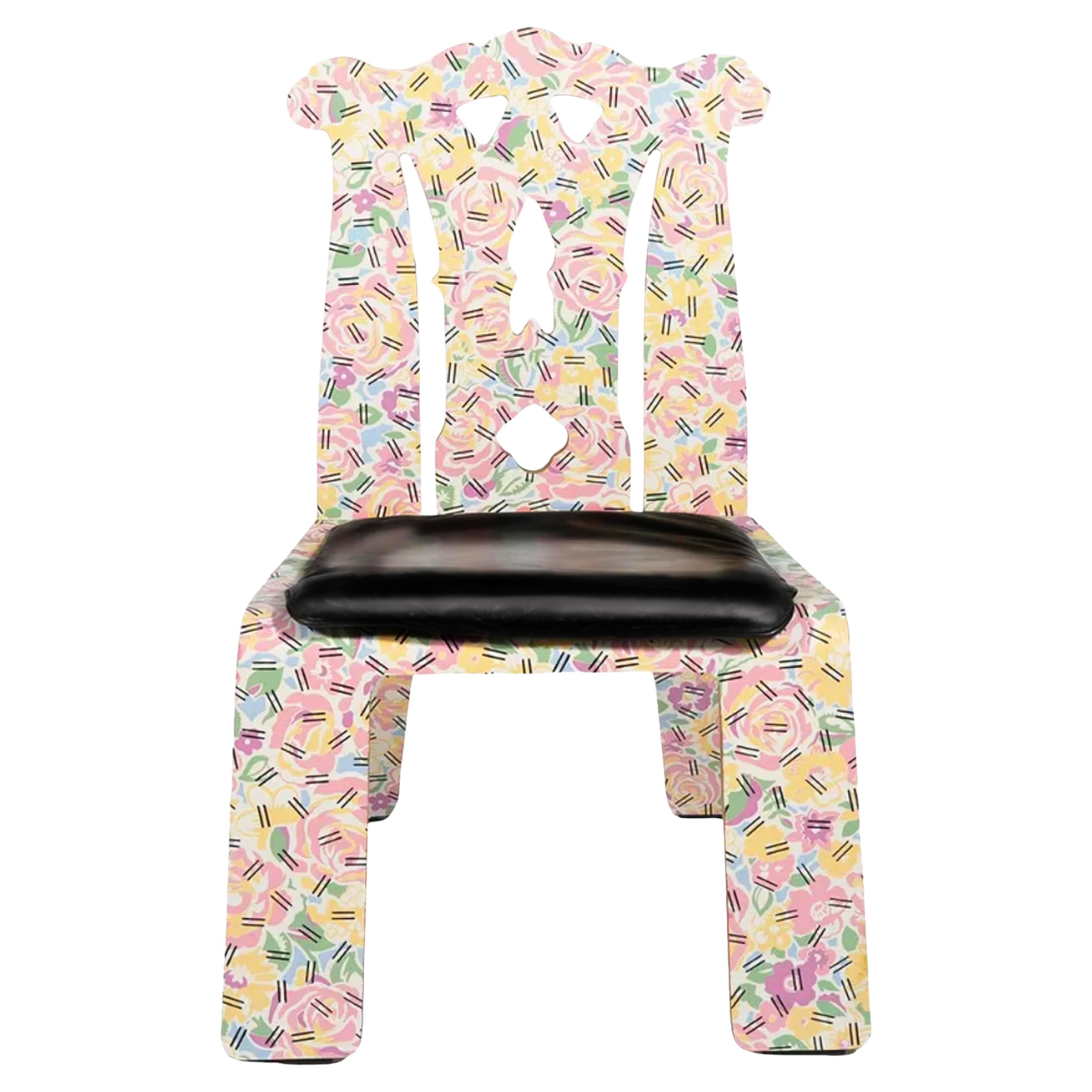Robert Venturi and partner Denise Scott Brown 'Chippendale' flattened design 'Grandmother' patterned chair for Knoll with laminate finish and black leather seat pad. Measures 21
