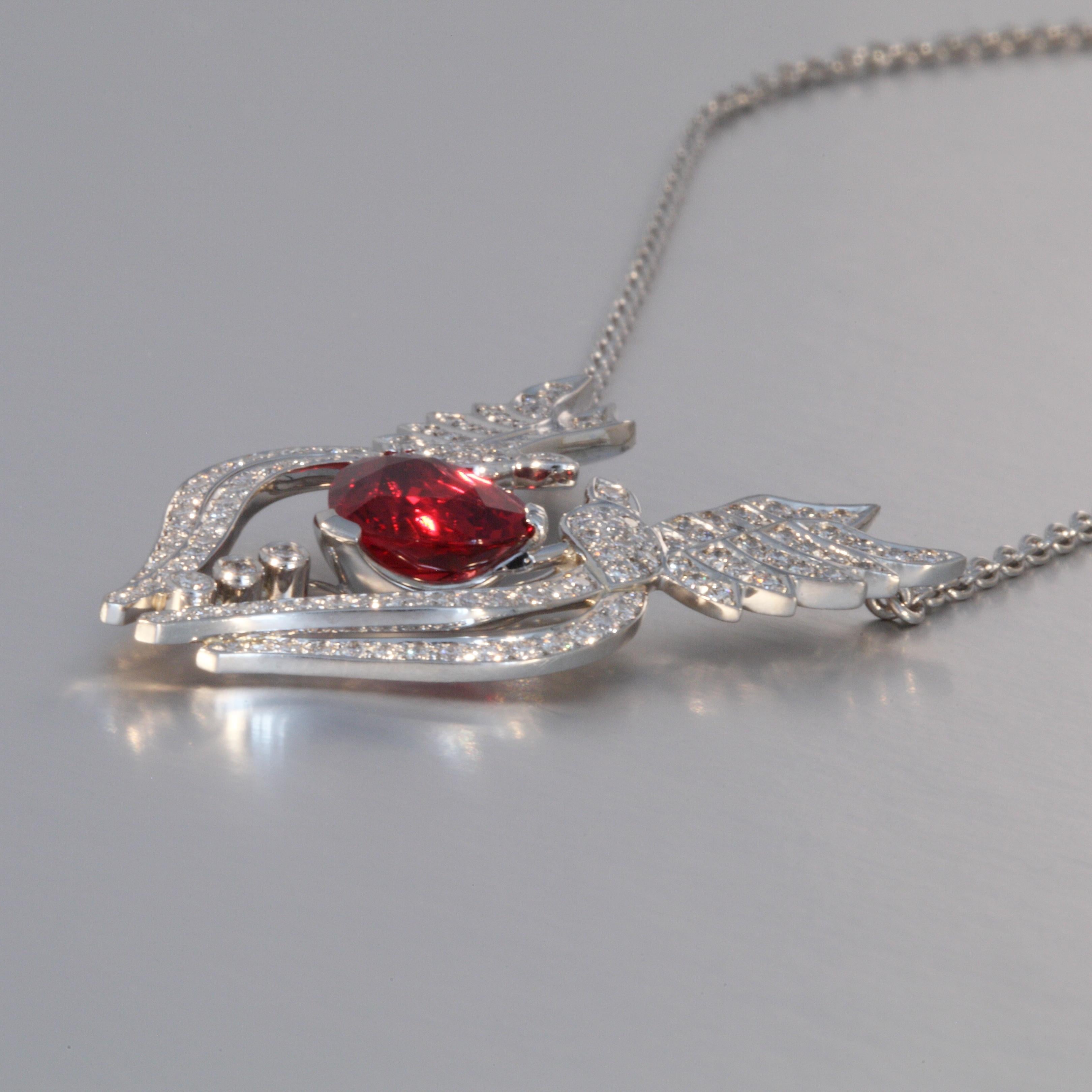 This platinum love bird pendant is set with a fine red Spinel heart 1.89 carats and 0.70 carats Diamonds F,G vvs on an attached chain. It is designed and hand made in Zurich, Switzerland by Robert Vogelsang and is a one of a kind piece signed