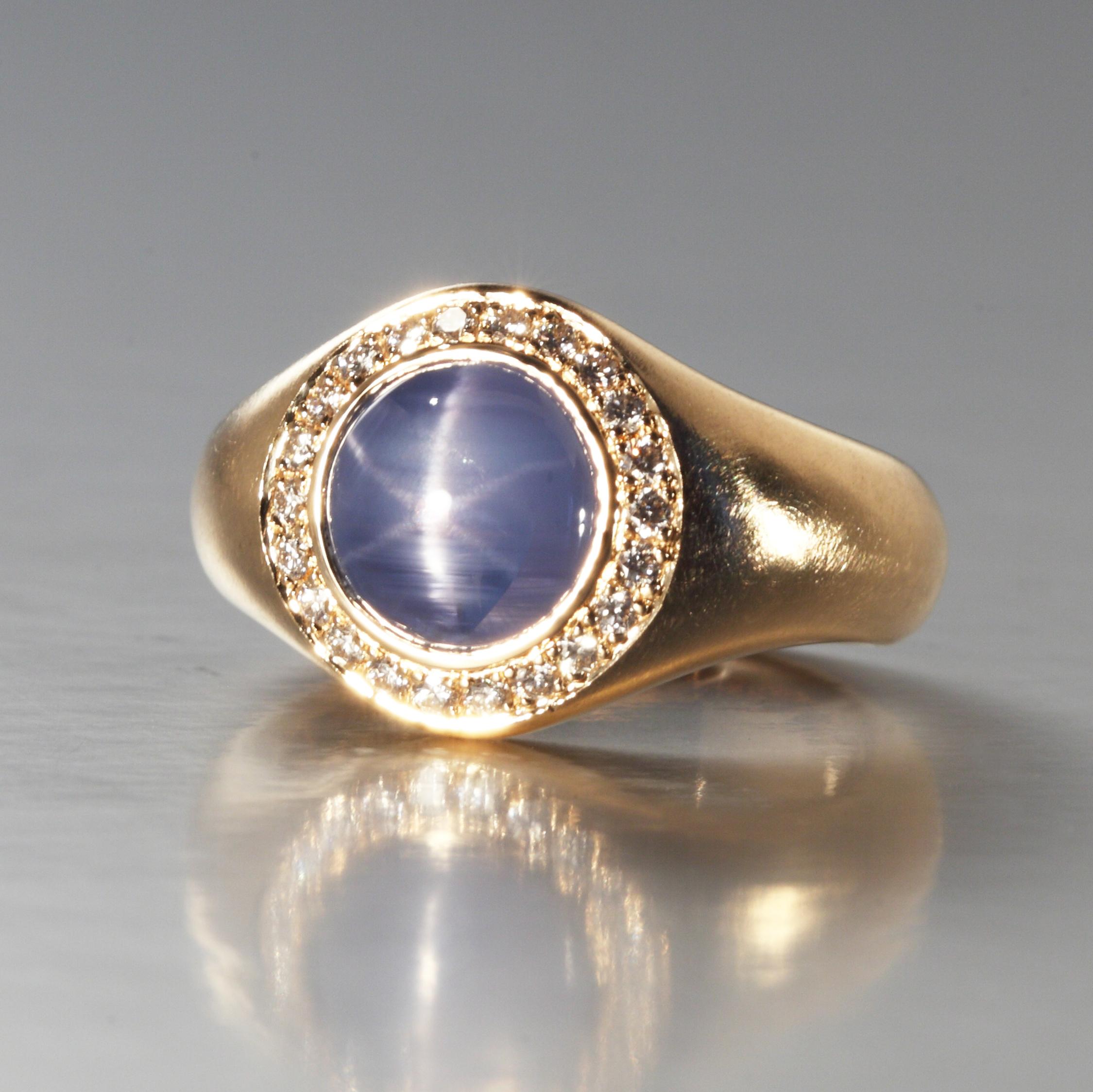 This star sapphire of 5.04 carats is set in a rose gold ring with 0.24 carats of diamonds F,G vvs. It is designed and hand made in Zurich, Switzerland by Robert Vogelsang and is a one of a kind piece signed RV.

It is set in 18K rose gold and weighs
