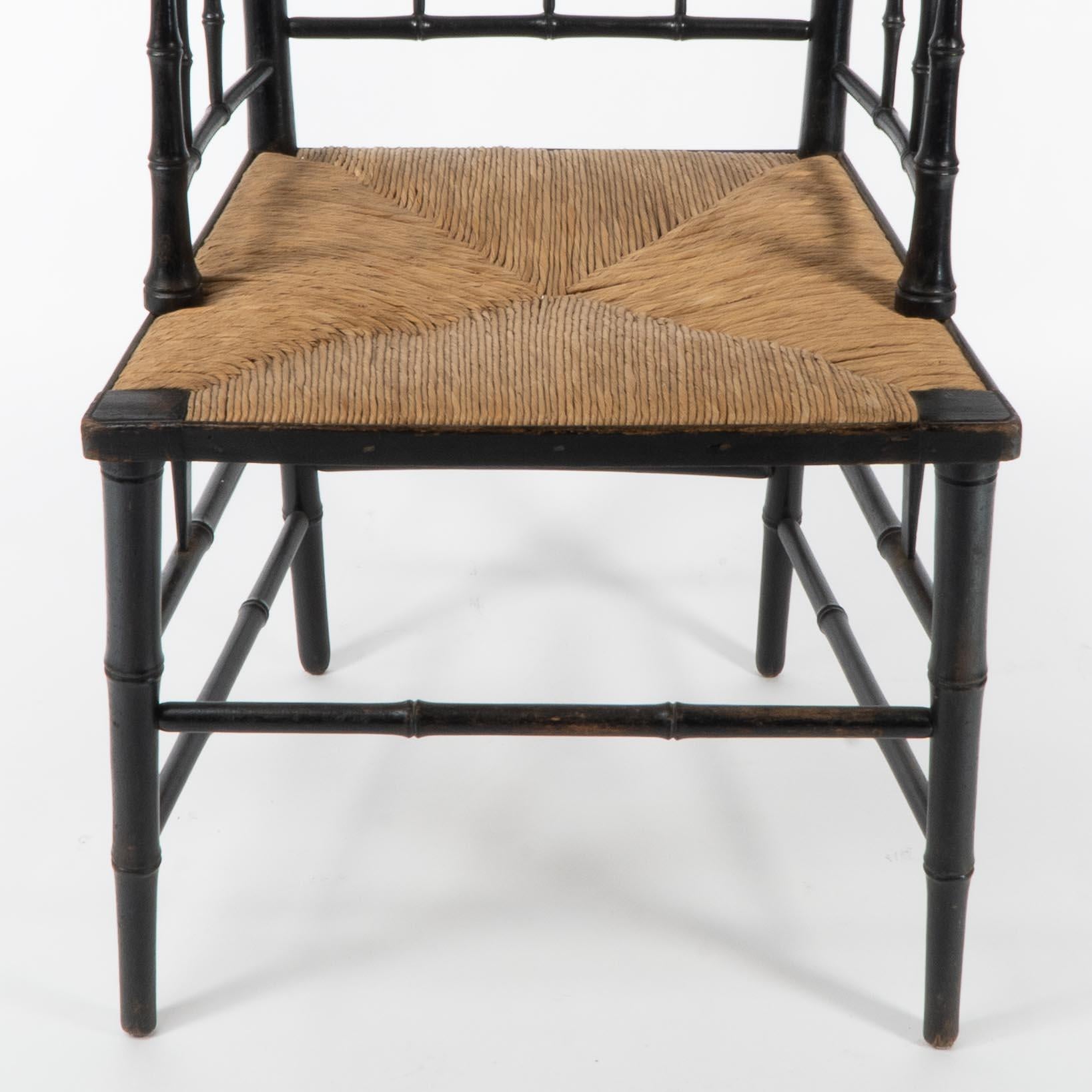 Robert W Edis, An Aesthetic Movement rush seat armchair in the bamboo style For Sale 2