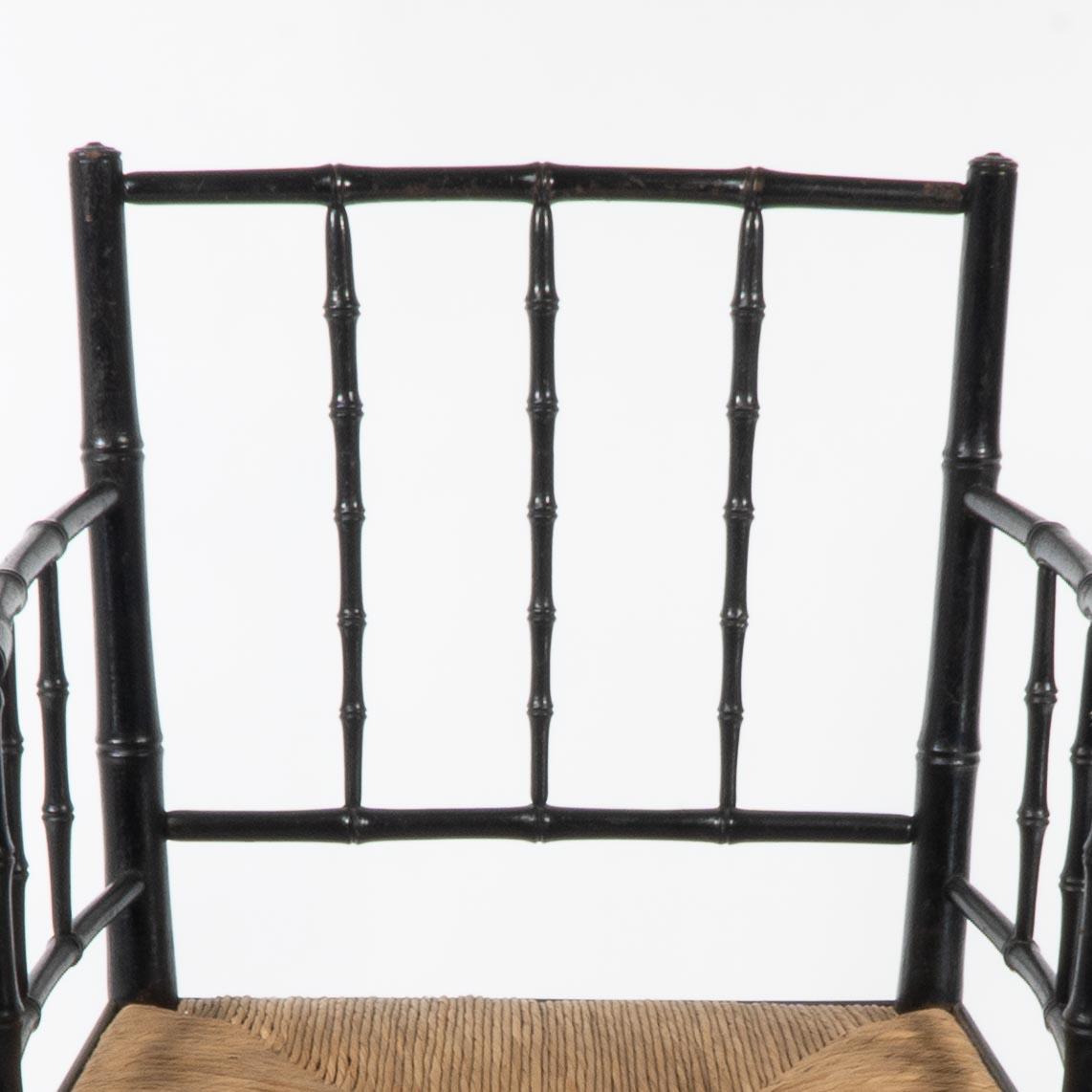 Late 19th Century Robert W Edis, An Aesthetic Movement rush seat armchair in the bamboo style For Sale