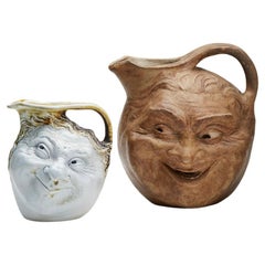 Robert Wallace Martin for Martin Brothers Two Glazed Double Face Jugs 