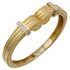 Robert Wander Vintage Manschettenarmband aus 18 Karat Gelbgold mit Schnörkeln und Diamanten