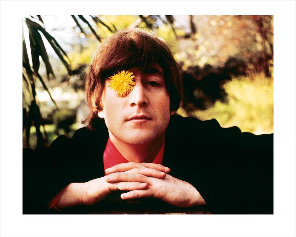 Iconic photo of John Lennon with a dandelion in his eye, fondly known as 'Adoration' by Robert Whitaker.

Photographed in the garden of his Weybridge home, the year that the Beatles received their MBE's - in recognition of the worldwide