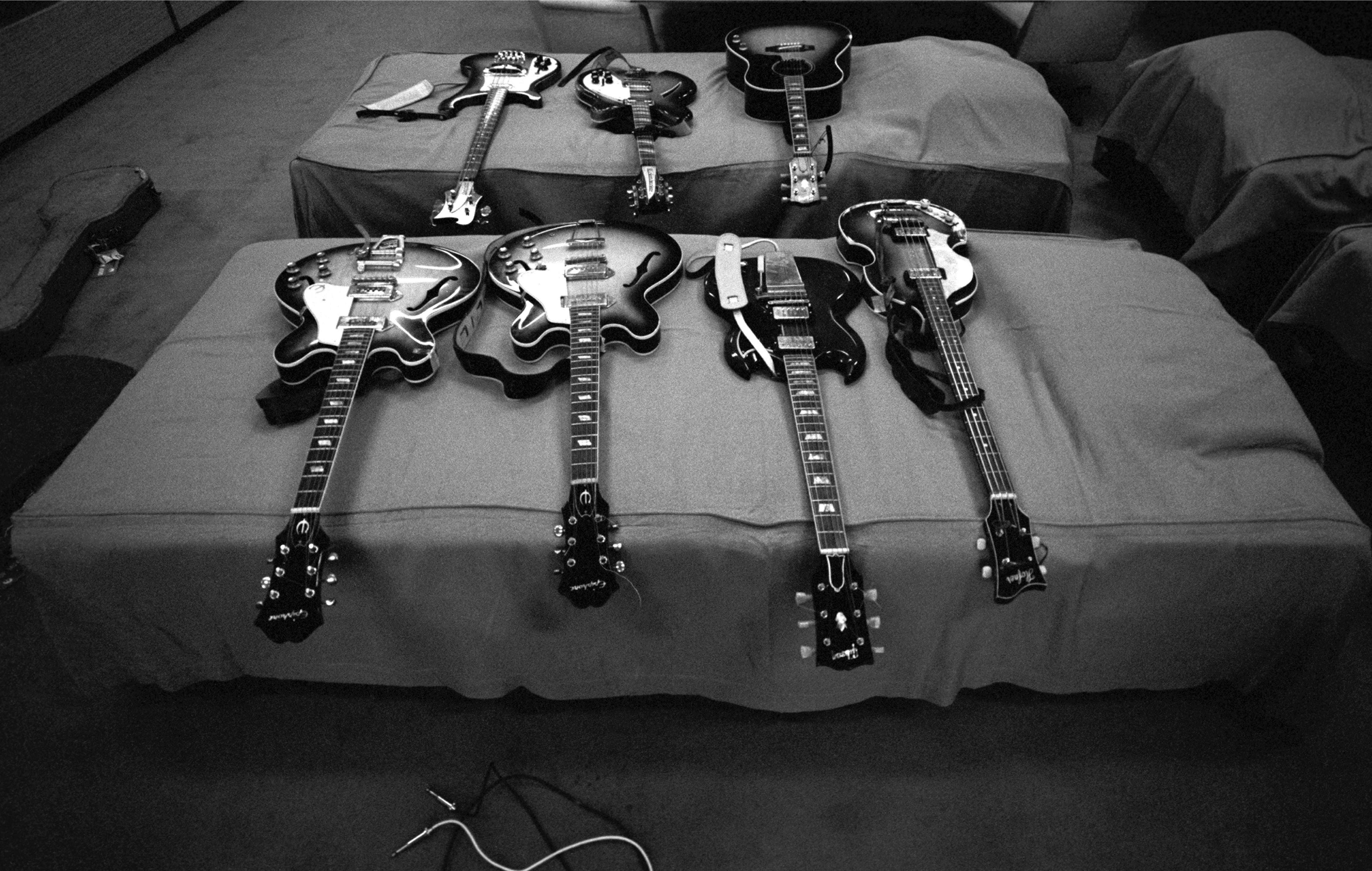 The Beatles Guitars, backstage in Tokyo Japan in 1966 by Robert Whitaker. 

All limited edition prints in this collection are hand numbered and authenticated with the official Robert Whitaker Estate Stamp. Available in two limited edition