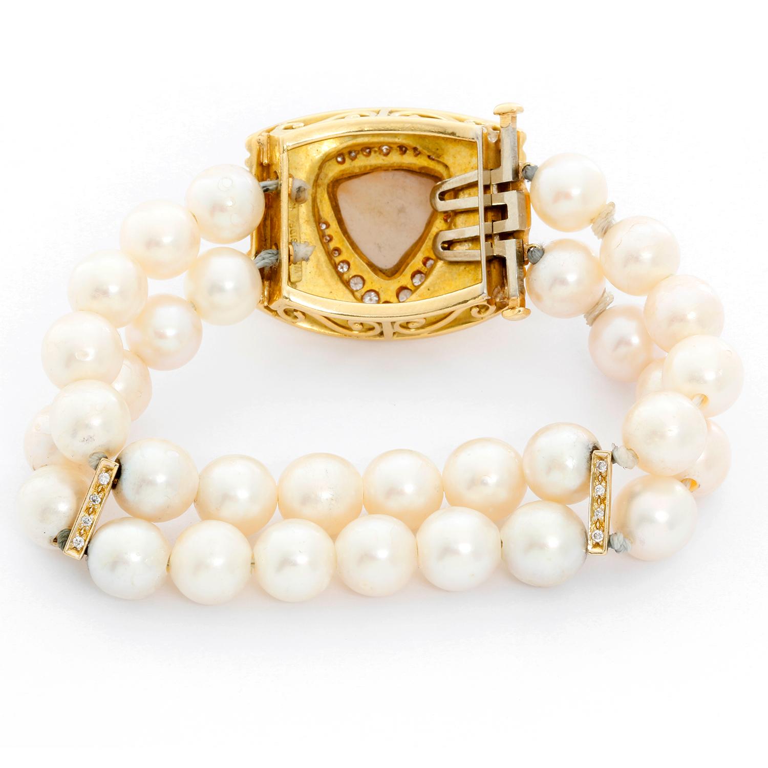 Robert Whiteside Diamond and Cultured Pearl Gold Bracelet - Robert Whiteside Diamond and Cultured Pearl Gold Bracelet  - a double row of 32 pearls on the bracelet measure 8.55mm - 9.20mm.  The braceletis accented with a Mabe pearl in the center