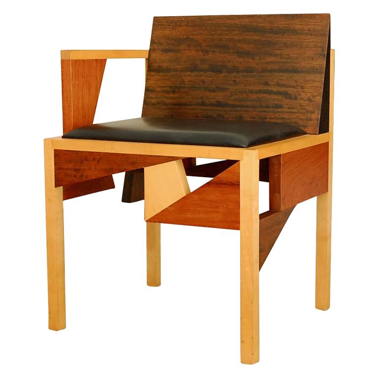 Robert Wilhite mix wood and leather one  arm chair, signed, studio