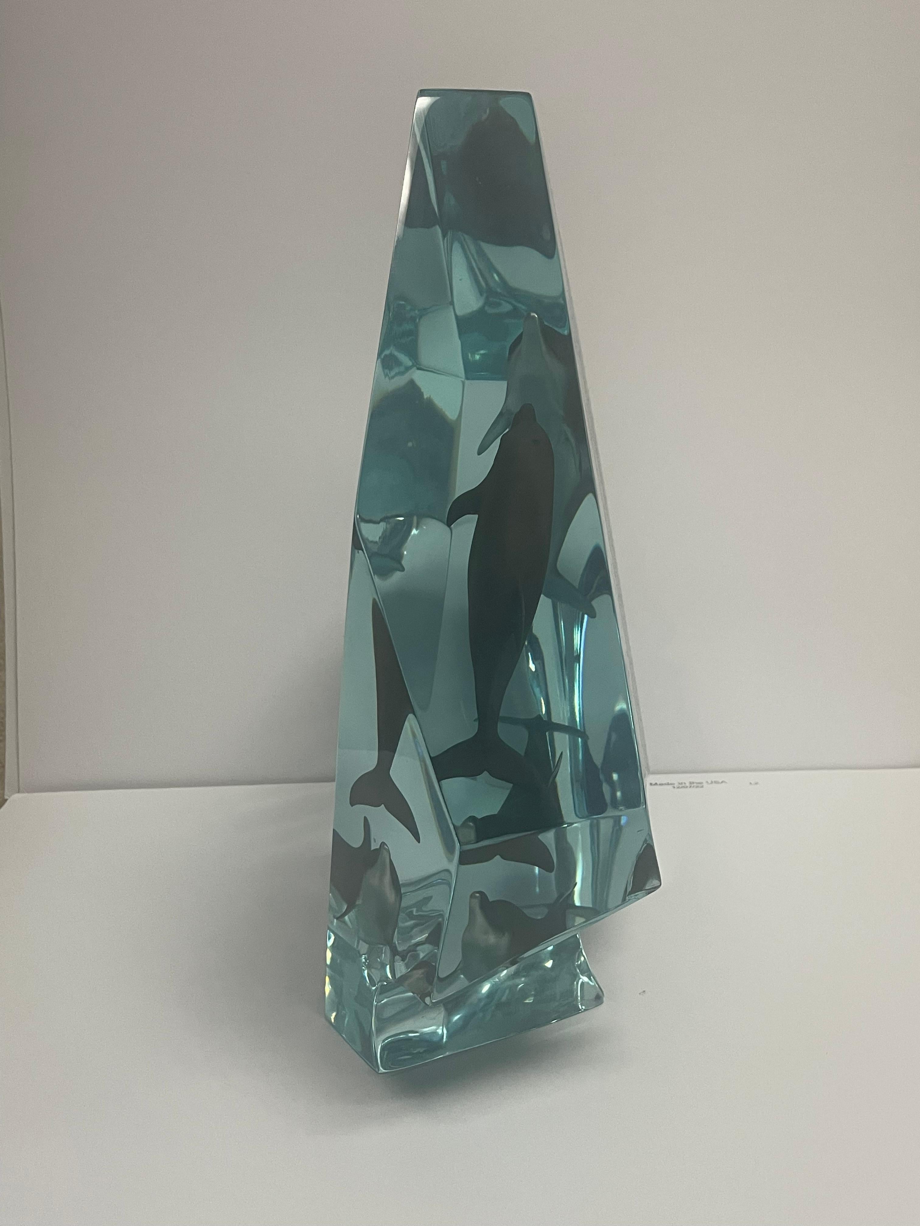 This is an. Robert Wyland “circle of life” acrylic glass sculpture 2002 with coa measures 15x14x5. In excellent condition

