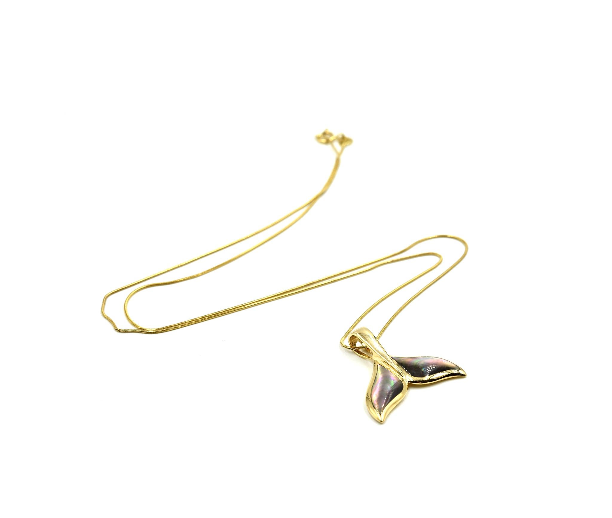 Designer: Robert Wyland
Material: 14k yellow gold
Dimensions: whale tail pendant is 3/4-inch long and 7/8-inch wide, necklace is 19-inches long
Weight: 5.20 grams
Retail: $595.00
