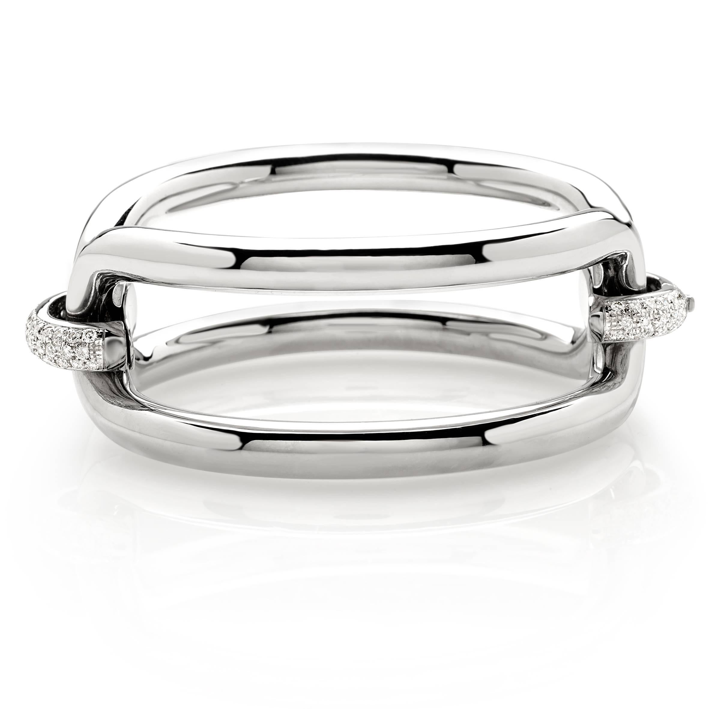 Roberta collection bangle in 18 kt  white gold and white diamonds 
The newest and more popular collection of this year

the total weight of the gold is  gr 59.7
the total weight of the white diamonds is ct 1.85 - color GH clarity VVS1

STAMP: 10 MI