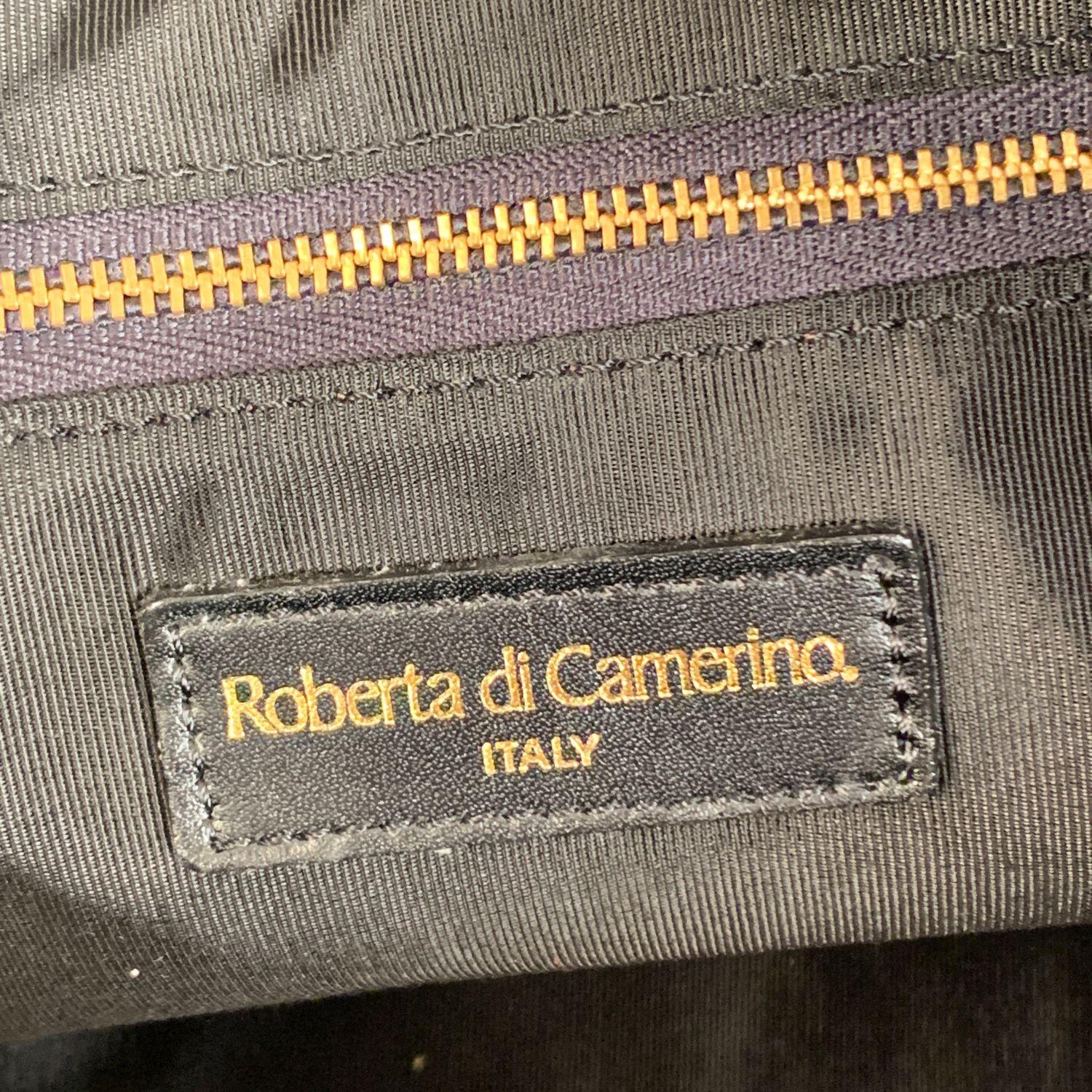 ROBERTA DI CAMERINO large satchel in black color with diamond logo pattern. Double top handles and removable and adjustable shoulder strap. The bag is very roomy so it is ideal as a travel bag. 1 main compartment with upper zipper closure. 2 side