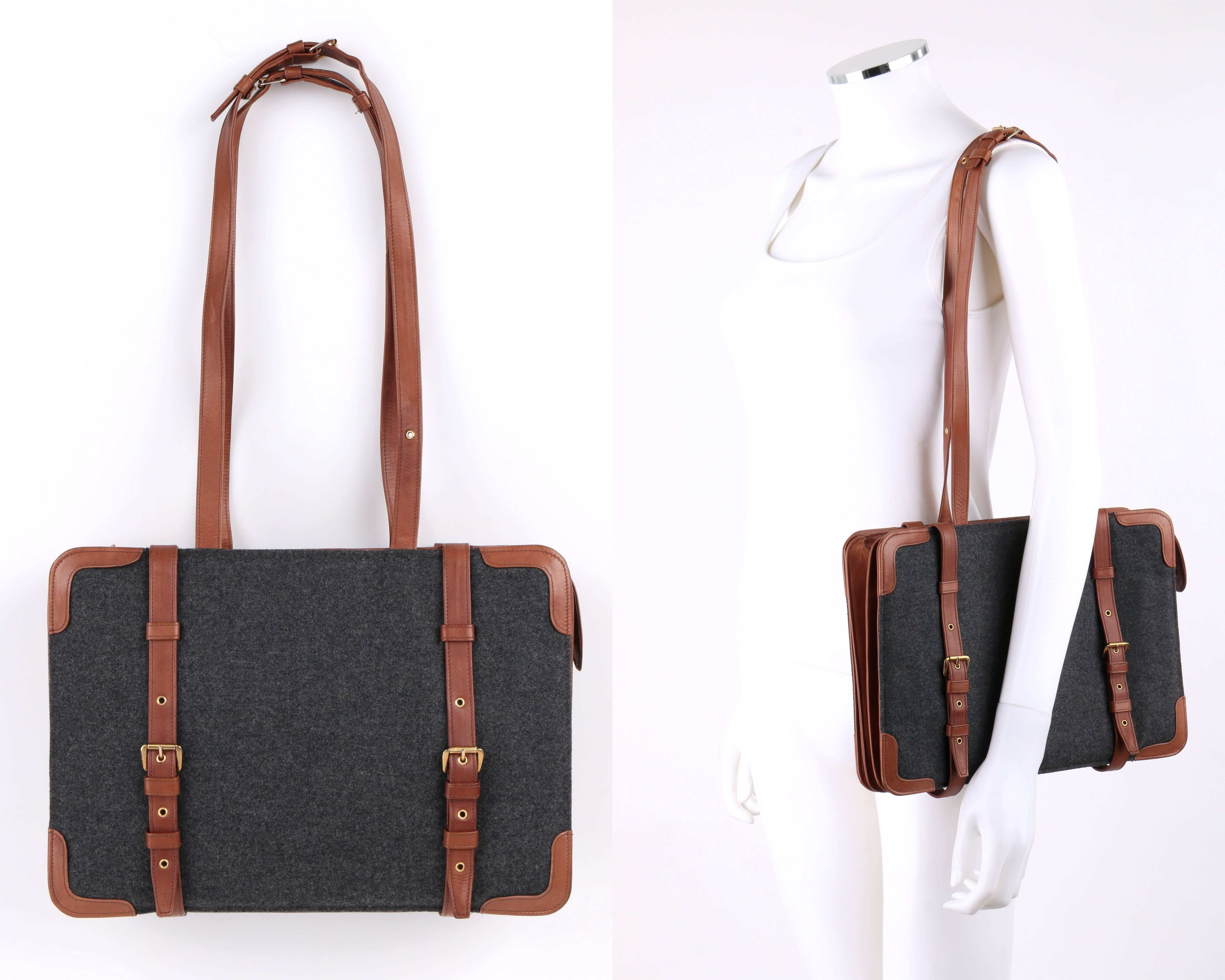 Vintage Robeta Di Camerino c.1976 gray wool and brown leather dual buckle satchel. Gray wool front and back panel with brown leather accents. Triple gusseted sides. Two adjustable brown leather straps with brass-toned metal buckle at front and back.