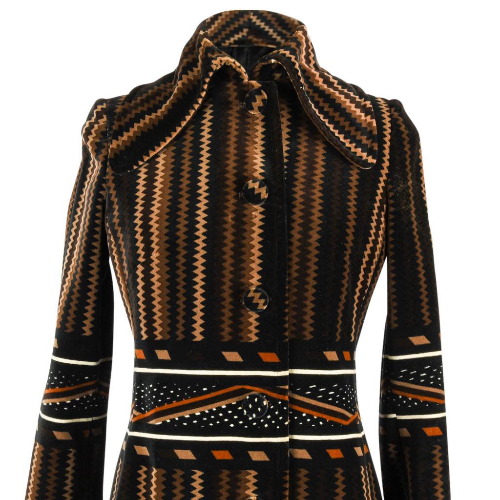 Guaranteed authentic Roberta di Camerino over the top velvet coat. 
Beautiful vertical zig zag design in camel to black with various shades of brown.
The bold collar can be worn flat or standing up.
Single breast with with 2 hidden pockets.
The 5