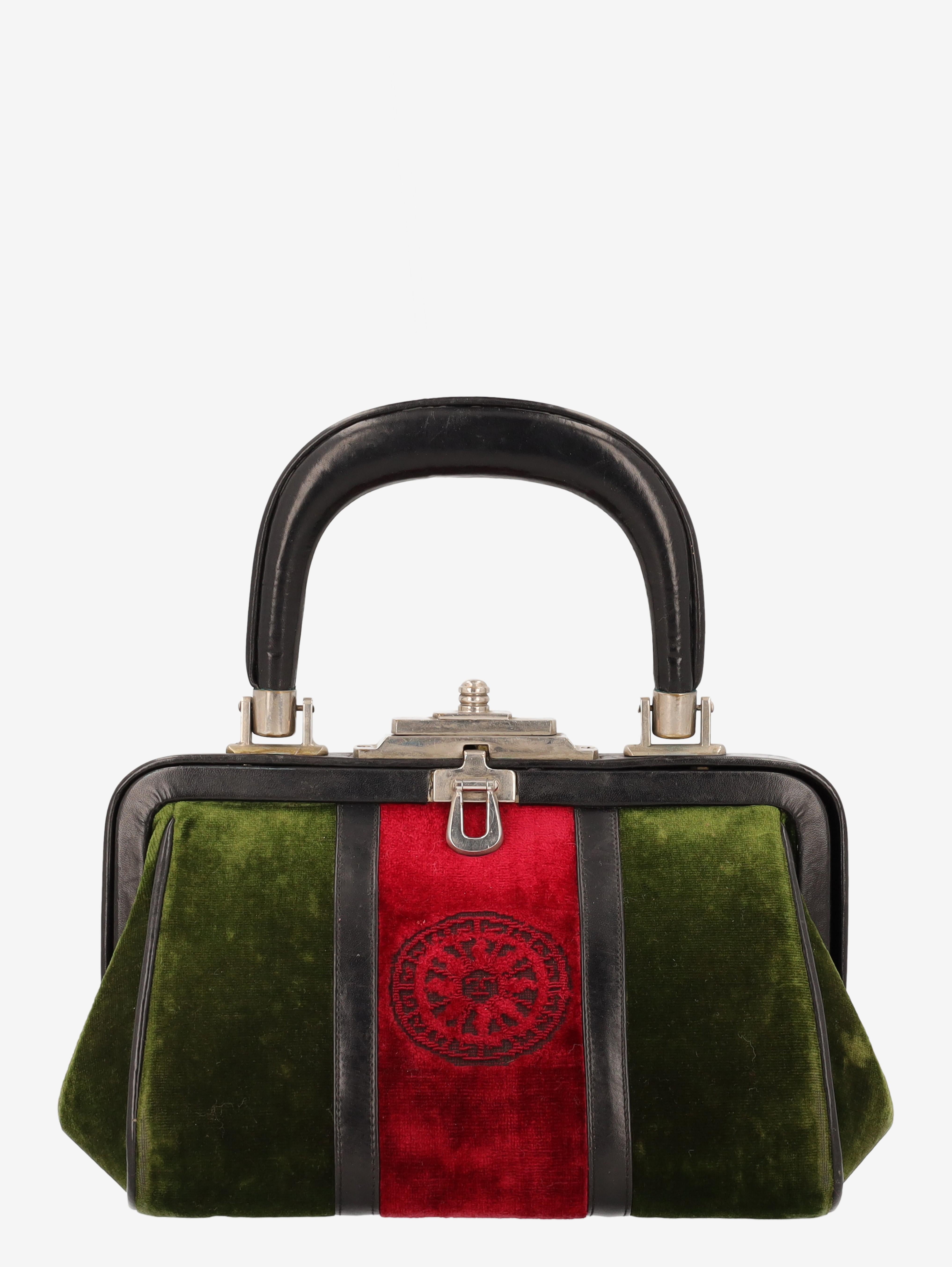 Roberta di Camerino Bagonghi Bag is the Roberta di Camerino's iconic bag from the 1950s and 1960s inspired by doctor's bags and lined in velvet, an unusual material for handbags. Rigid structure and leather interior, metal details, with green velvet
