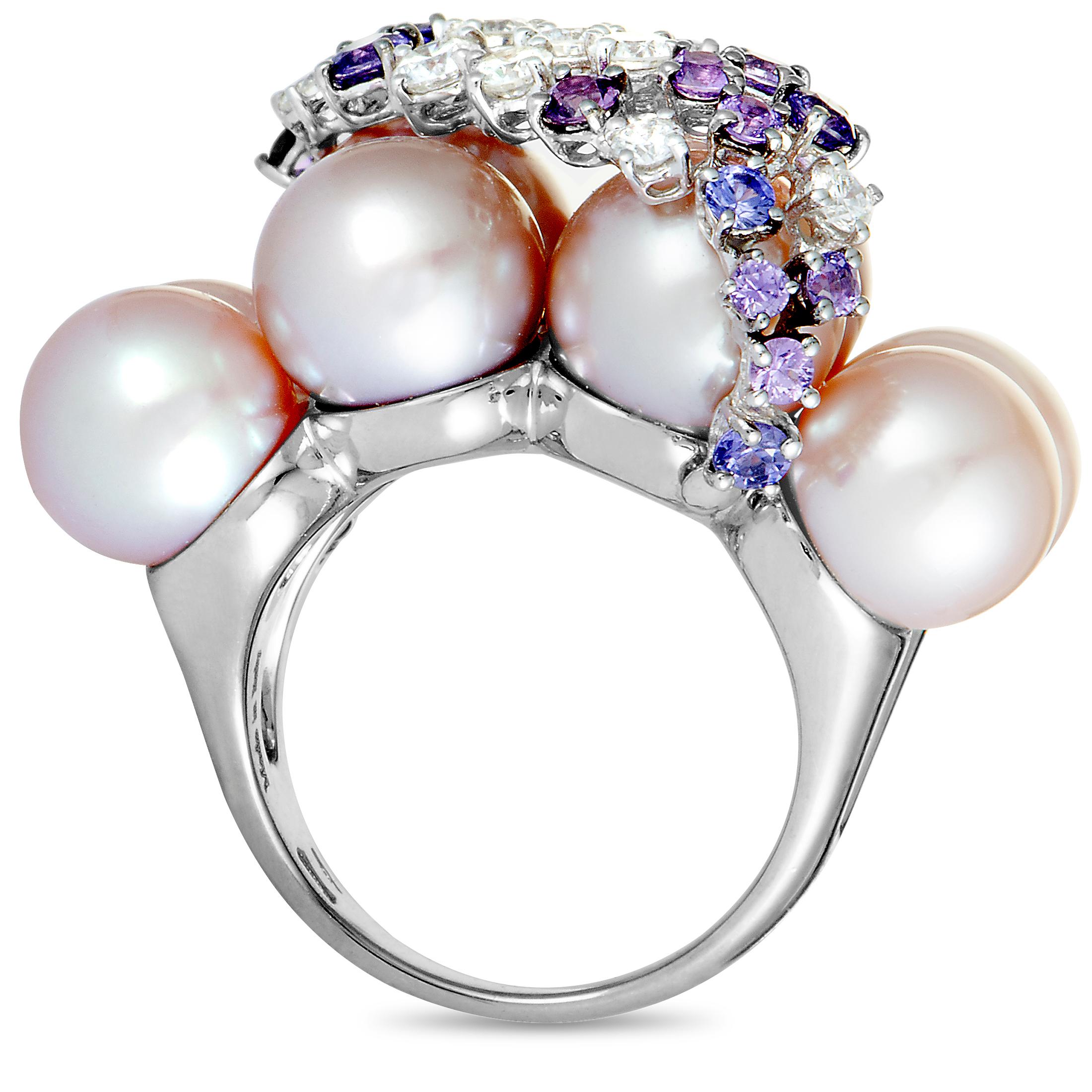 This Roberta Porrati ring is crafted from 18K white gold and weighs 24.7 grams. It is set with eight pearls, a total of 0.83 carats of white diamonds, and a total of 1.27 carats of purple sapphires. The ring boasts band thickness of 3 mm and top