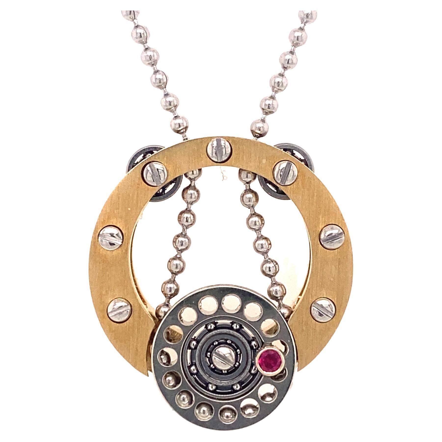Roberto Brun Mechanical 14k Gold Ruby Pendant Necklace For Sale