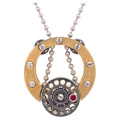 Roberto Brun Mechanical 14k Gold Ruby Pendant Necklace
