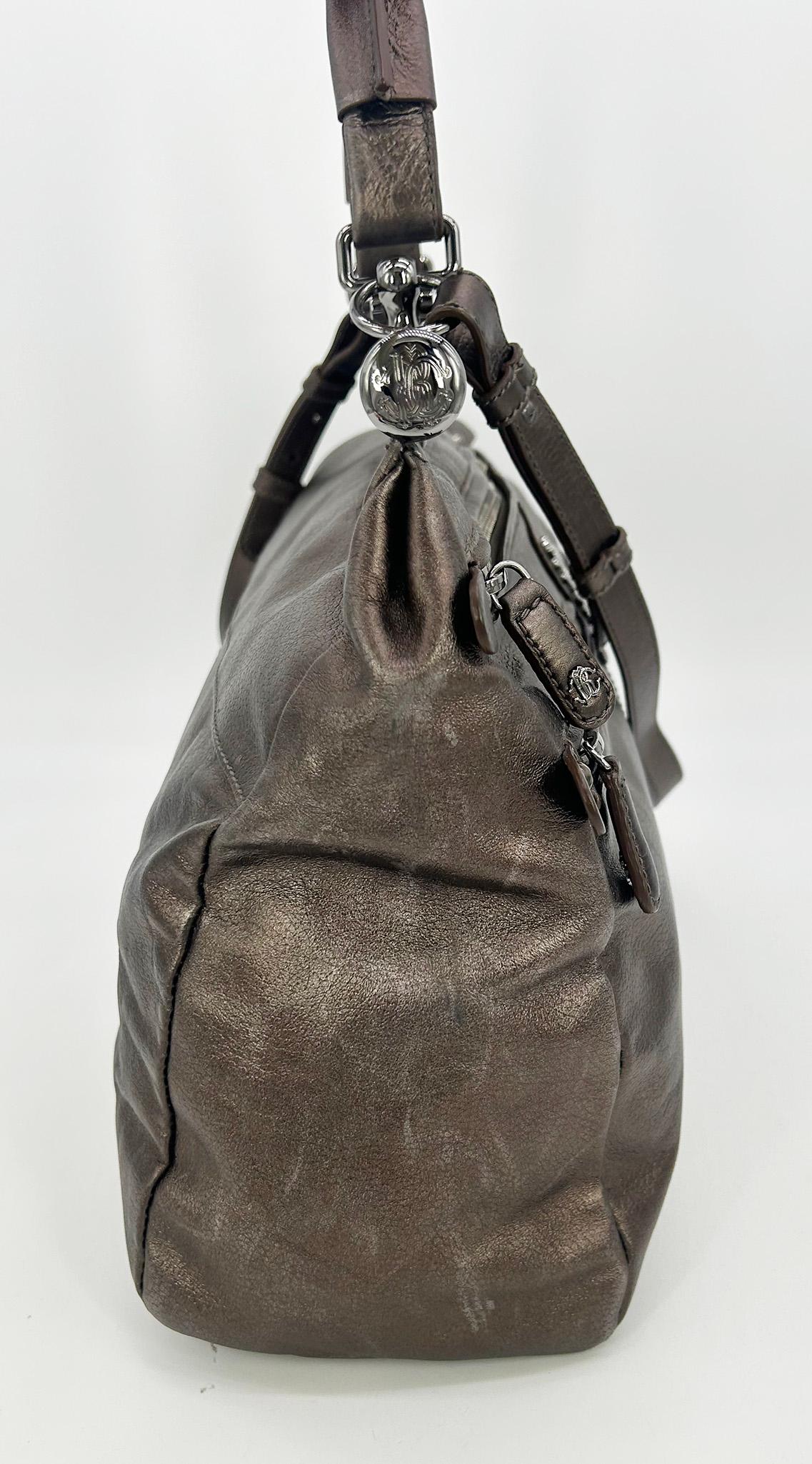 Roberto Cavali Metallic Bronze Leather Diva Bag in good condition. Metallic bronze leather exterior trimmed with gunmetal hardware in classic Diva bag design. Front features Roberto Cavalli center emblem in gunmetal with 3 zipper pockets. 2 smaller