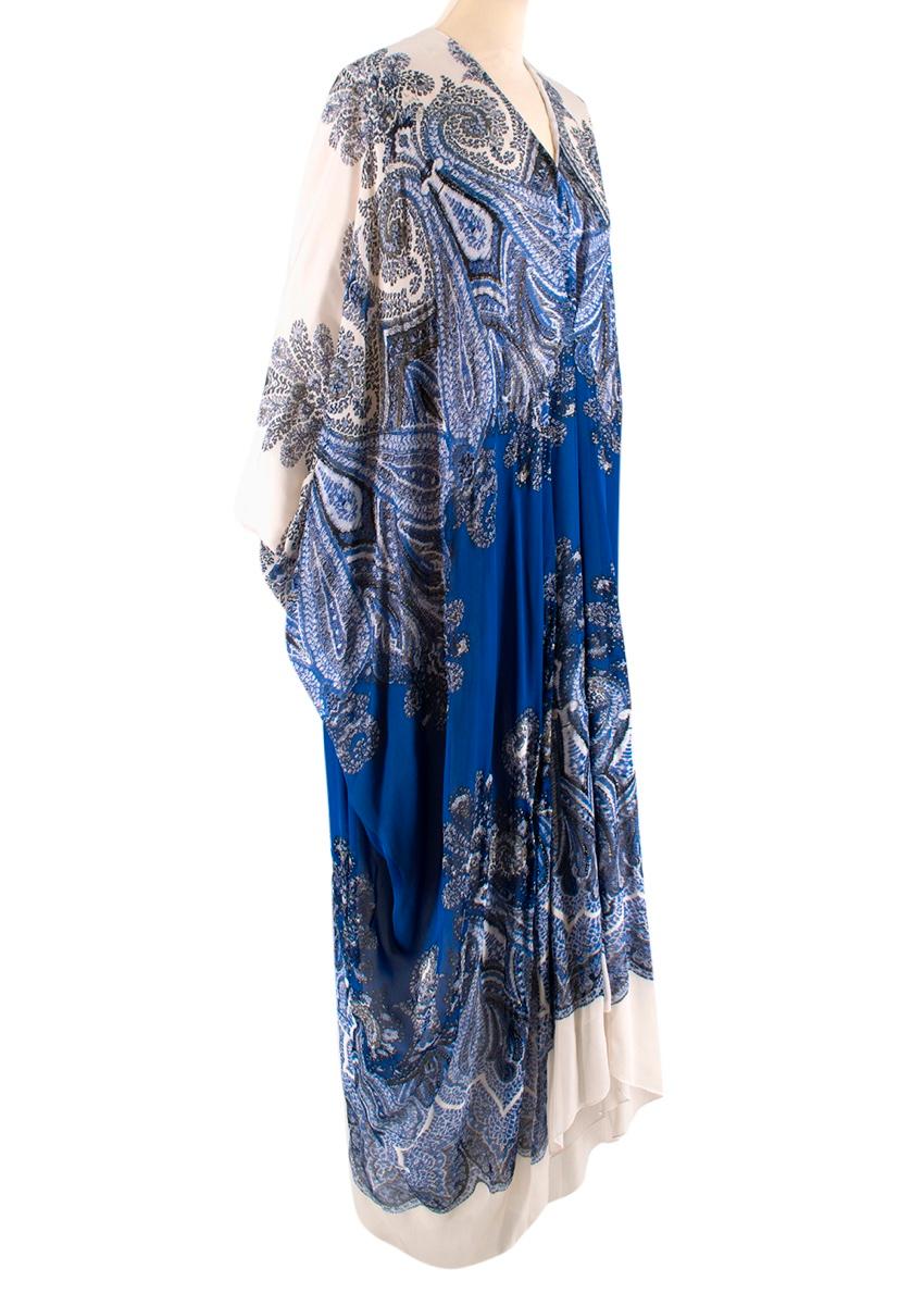 Roberto Cavalli Blue & White Paisley Silk Dress

- Oversized floaty fit with Gold glitter dotted around the dress
- Floral & spiral design
- Soft silk blend with cobalt blue hues
- Mid weight material
- Buttoned fastening at the front with pleat