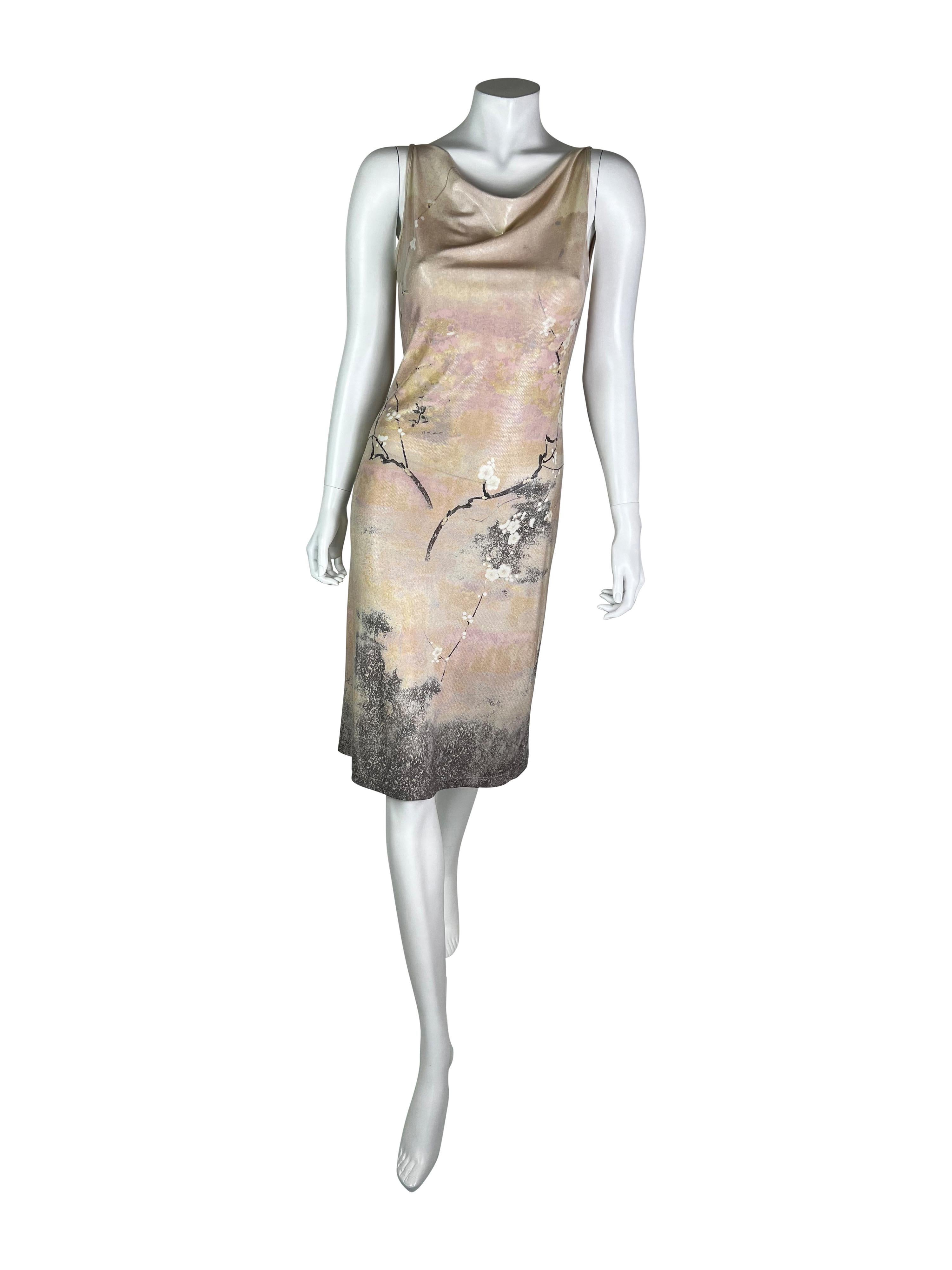 A stunning, super comfortable Roberto Cavalli dress with Sakura Print and a reflective wet look. 

Missing size label, but a dress would fit the best sizes M and L. 

Excellent vintage condition. 