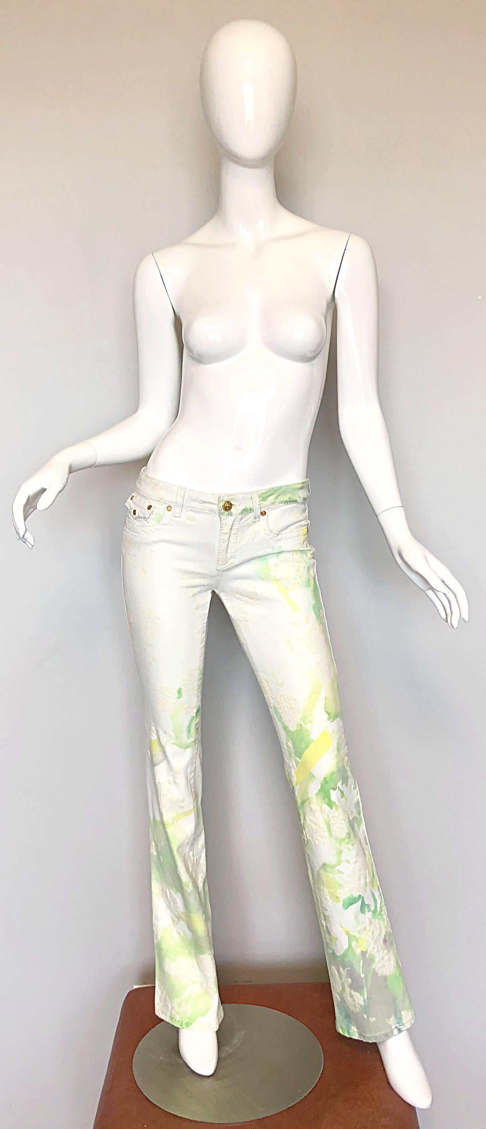 Amazing early 2000s vintage ROBERTO CAVALLI unworn lowrise boot cut trousers / jeans! Features a flattering low rise cut that sits at the hips. Slim legs, with a slightly flared hem. Stretchy denim like fabric. Belt loops and gold button closure at
