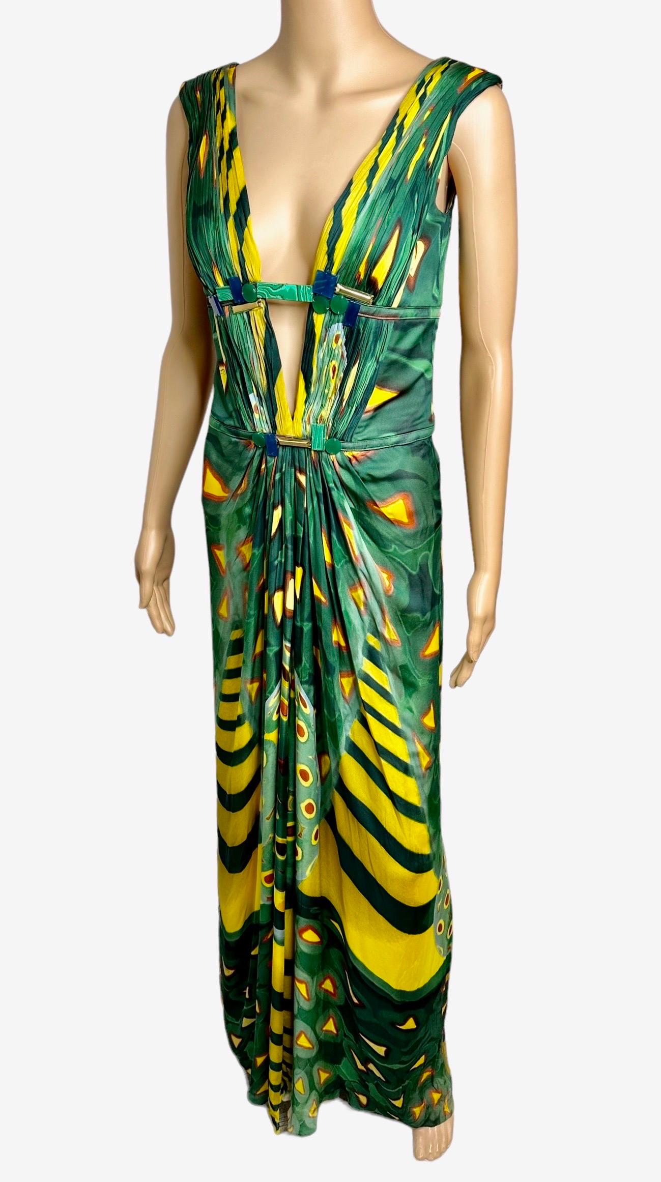 Roberto Cavalli 2009 Sexy Plunging Neckline Open Back Evening Dress Gown 

Roberto Cavalli abstract print evening dress featuring gathering on the bodice, deep plunging neckline, cutout back and concealed zip closure at center back. Please note