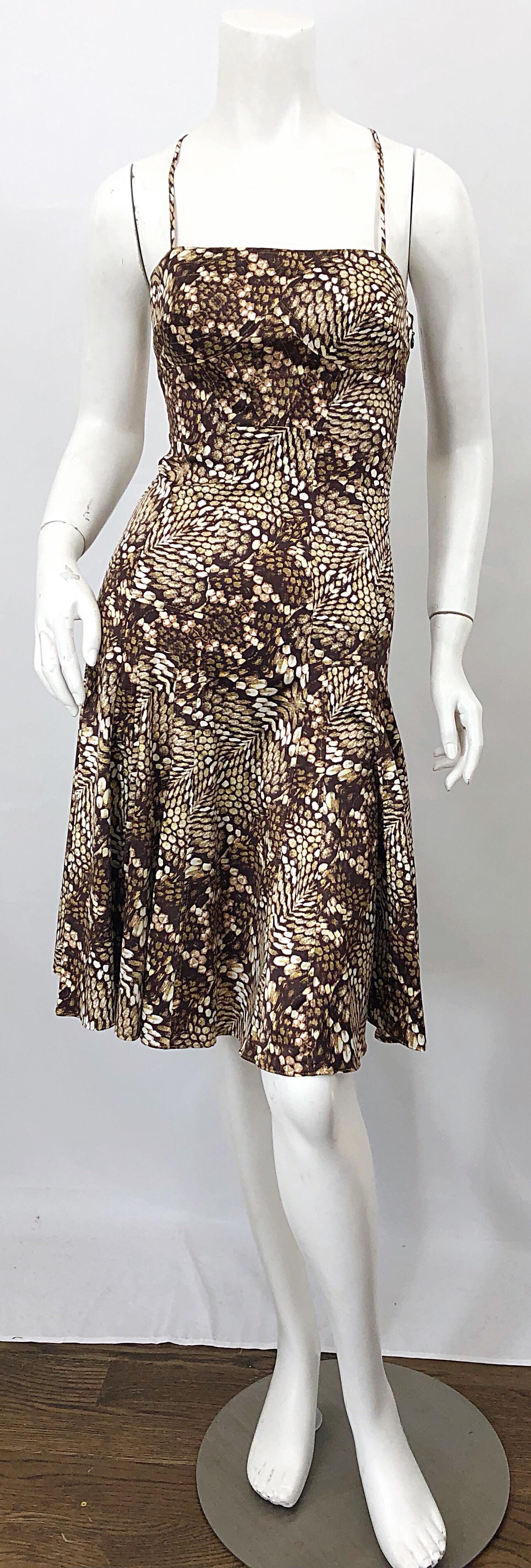 Flirty early 2000s ROBERTO CAVALLI brown and ivory snakeskin python animal print silk dress! Racerback straps with lucite and brass ring connecting the straps on the back. Fitted bodice with a flirty forgiving skirt. Hidden zipper up the side with