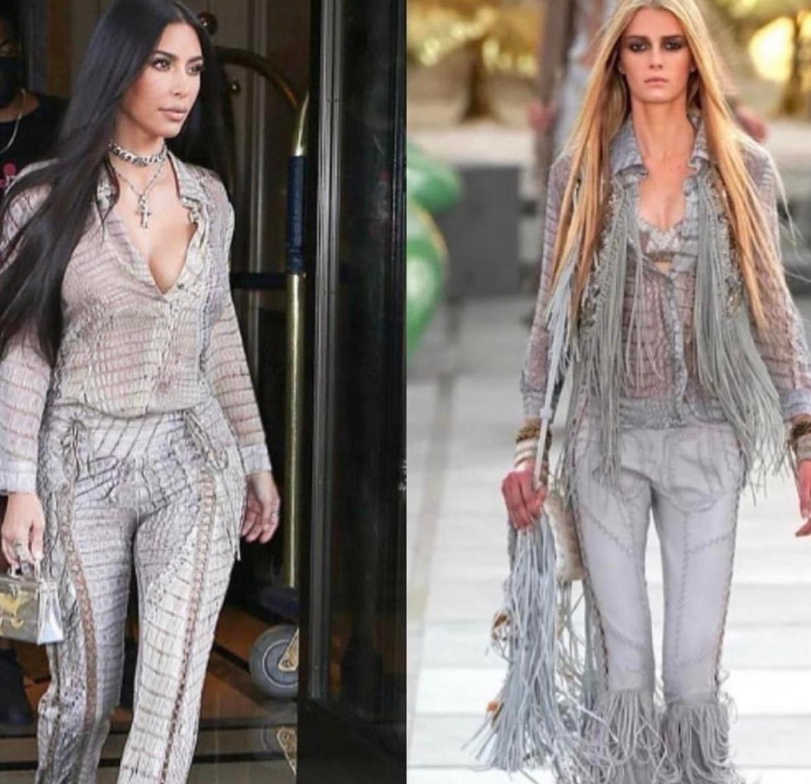 Wie bei Kim Kardashian gesehen 

Roberto Cavalli Seidenbluse mit Lederschnürung 

Größe 44. Passt eher wie eine S/M

Guter Vintage-Zustand. Marke Tag halb freistehend

Aus der Laufstegkollektion 2011