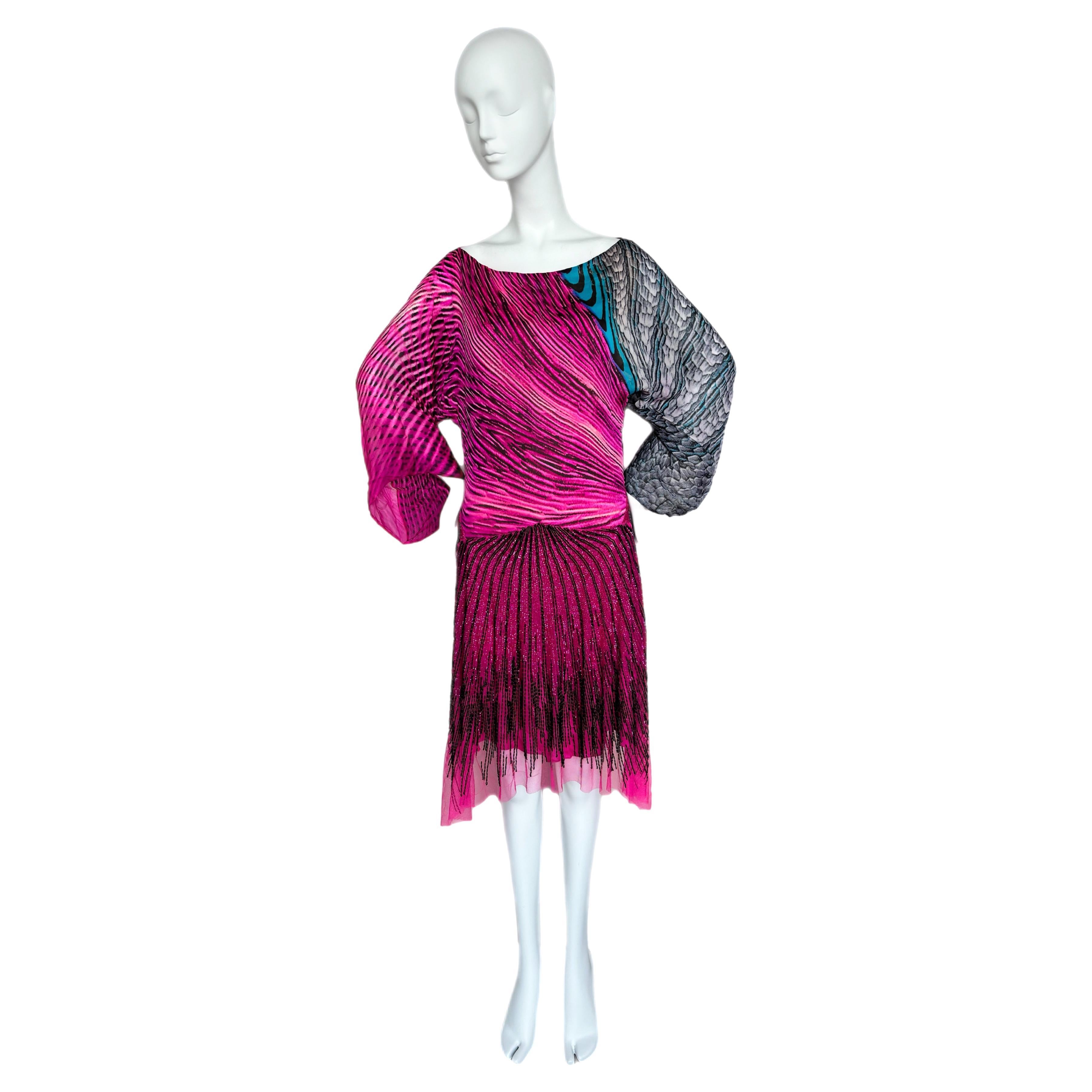 Roberto Cavalli
SS01
Vintage
100% silk psychedelic print
Similar to Runway
Can also be worn off the shoulder
Can also be worn snapped up for shorter sleeves
Size Small
Excellent condition

FINAL SALE