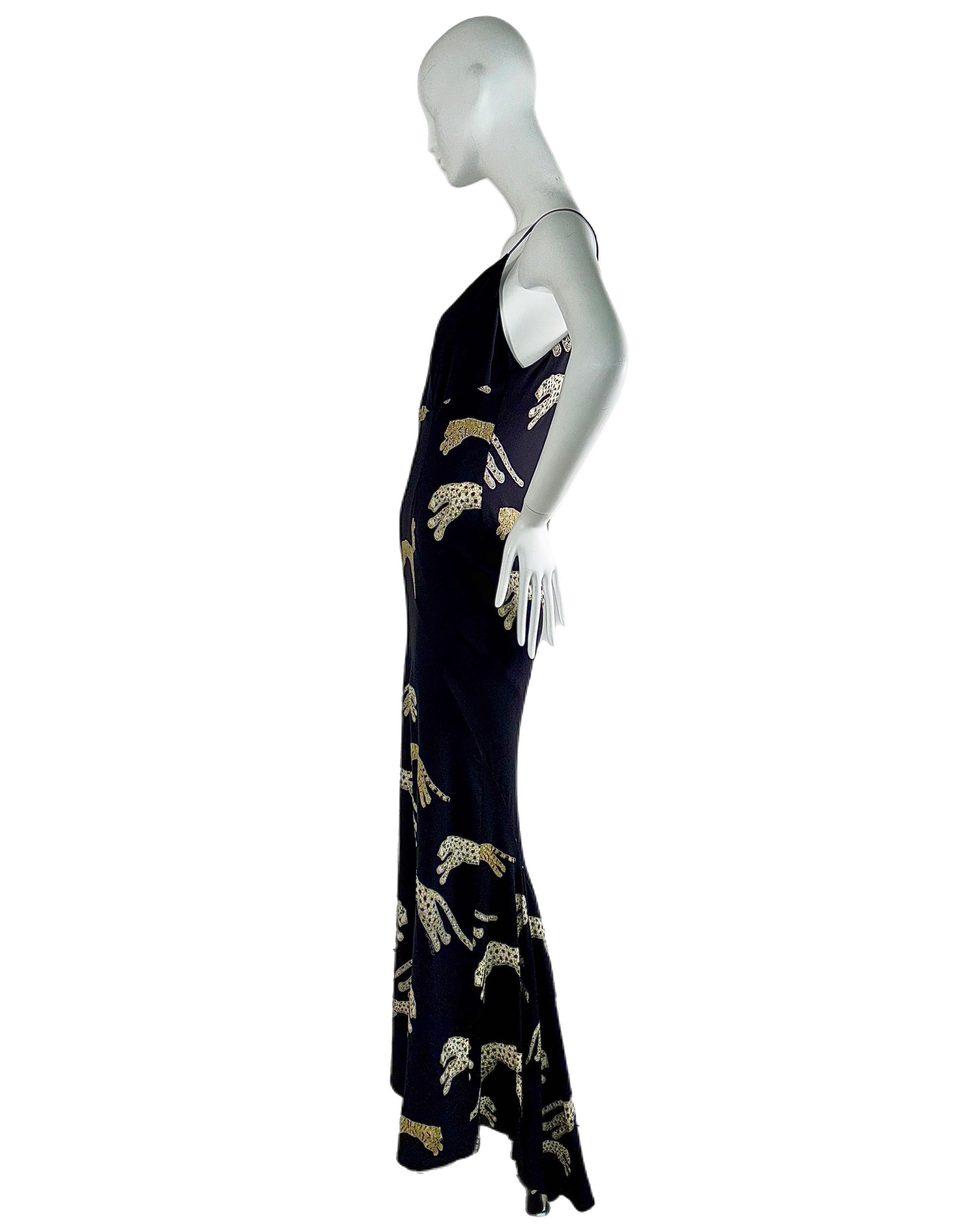 Roberto Cavalli
FW02
Vintage
Oro y plata metalizados Estampado de guepardo/leopardo/jaguar
97% seda, tiene algo de elasticidad
Talla XL
Jersey
Excelente estado, sin defectos dignos de mención
Medidas en centímetros en posición horizontal: largo sin