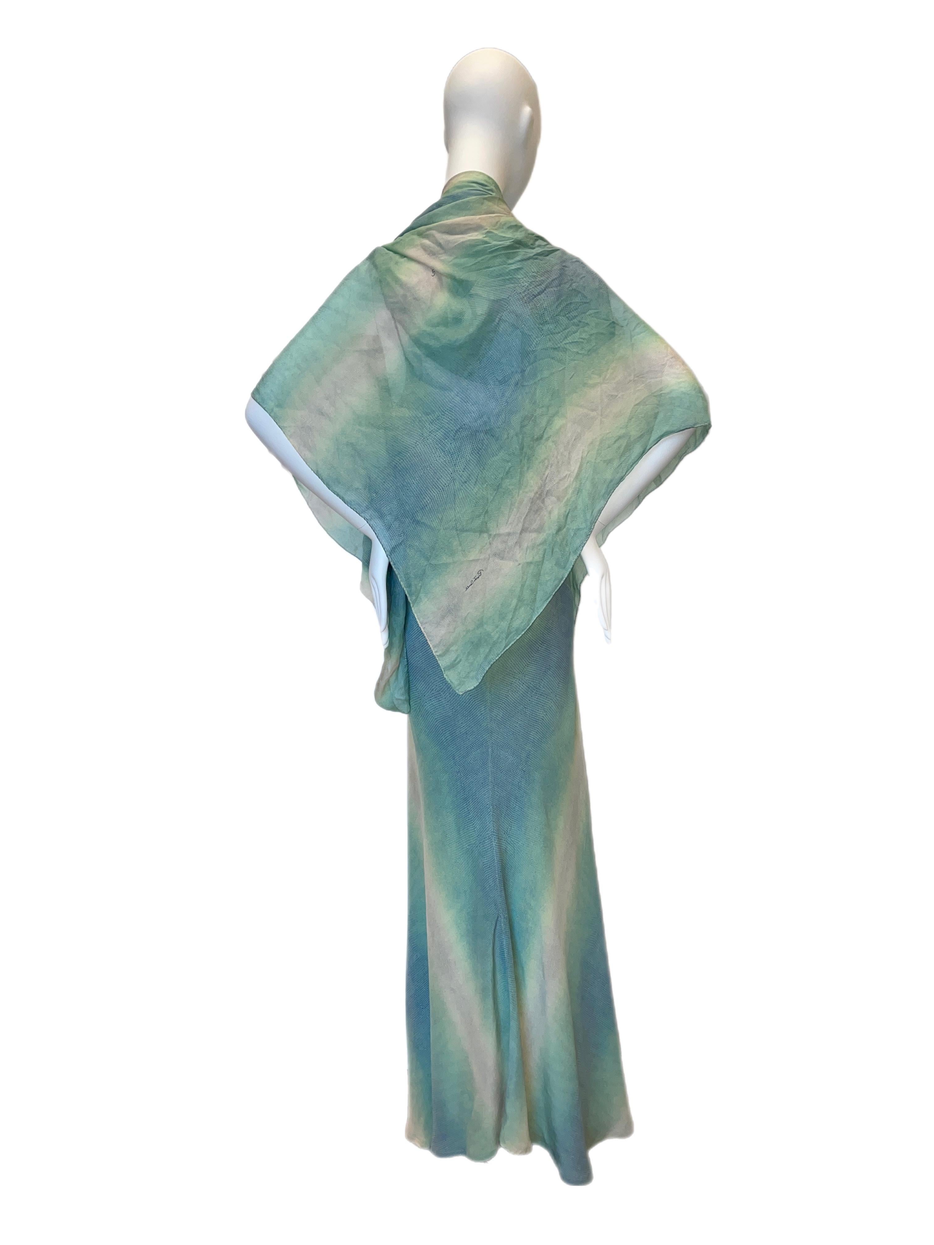 FINAL SALE. NO REFUNDS NOR RETURNS

SS02 vintage Roberto Cavalli silk maxi dress with matching shawl. Amazing reptile print in blue and green hues. Size L fits true to size. Worn by Pamela Anderson in tan.

Excellent condition, one small spot on the