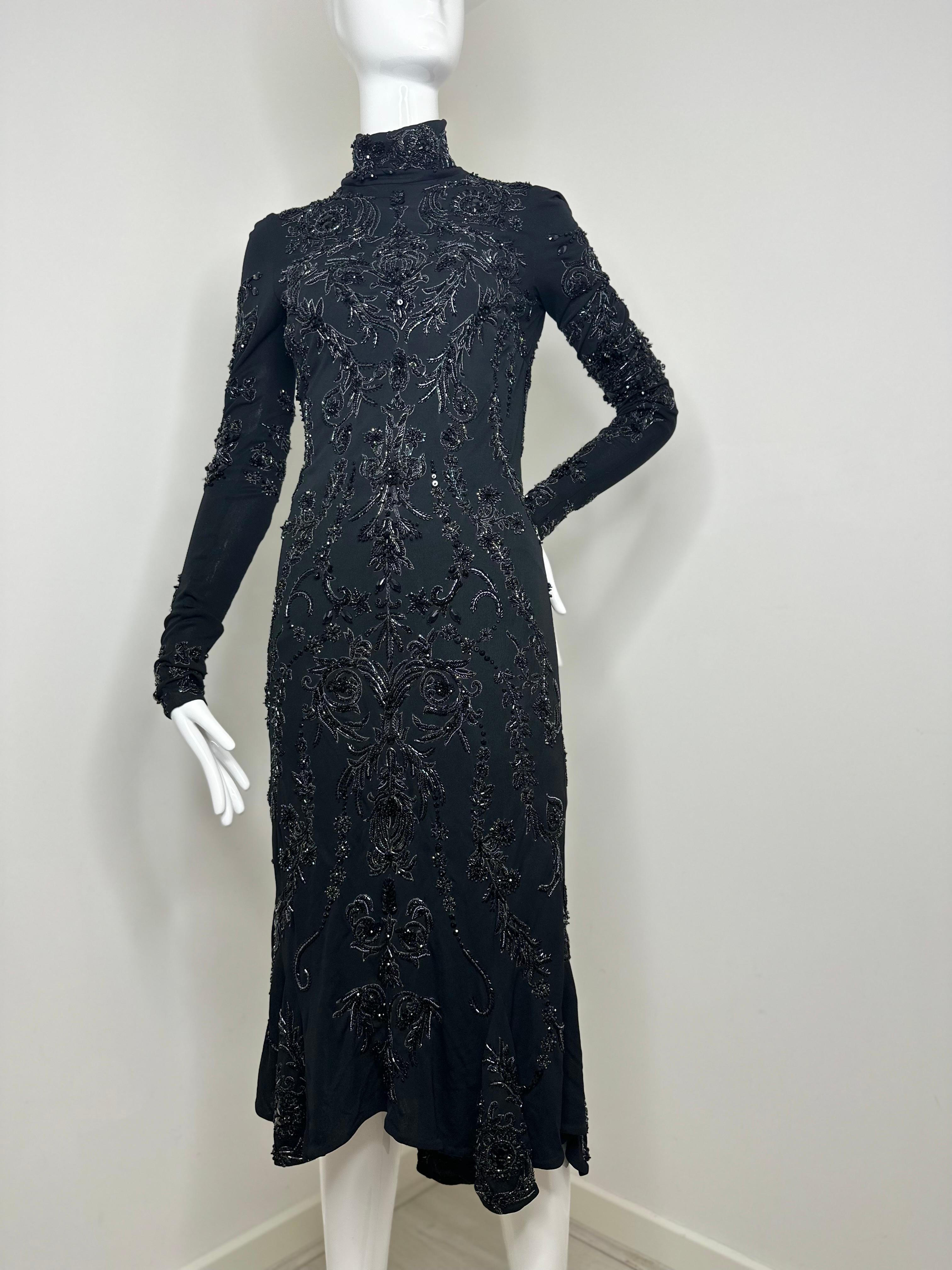 Roberto Cavalli 2003 black open back midi dress 

Fully covered in exquisite hand sewn beads 
Size 40 would fit XS best 
New with tags, original price $29,000

Side zipper in the neck area 
Approx. flat measurements:
Length: 46 inches 
Waist: 12.5