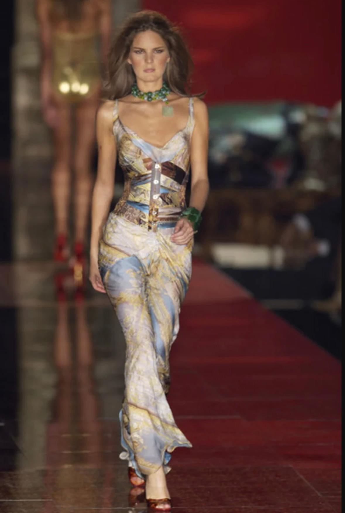 Holy Grail Archival Cavalli Gown

Thie beautiful Roberto Cavalli’s Spring/Summer 2003 gown is an exquisite statement in feminine allure, a masterpiece of fluid elegance. Well documented and worn on the legendary Runway Show.
The dress embraces the