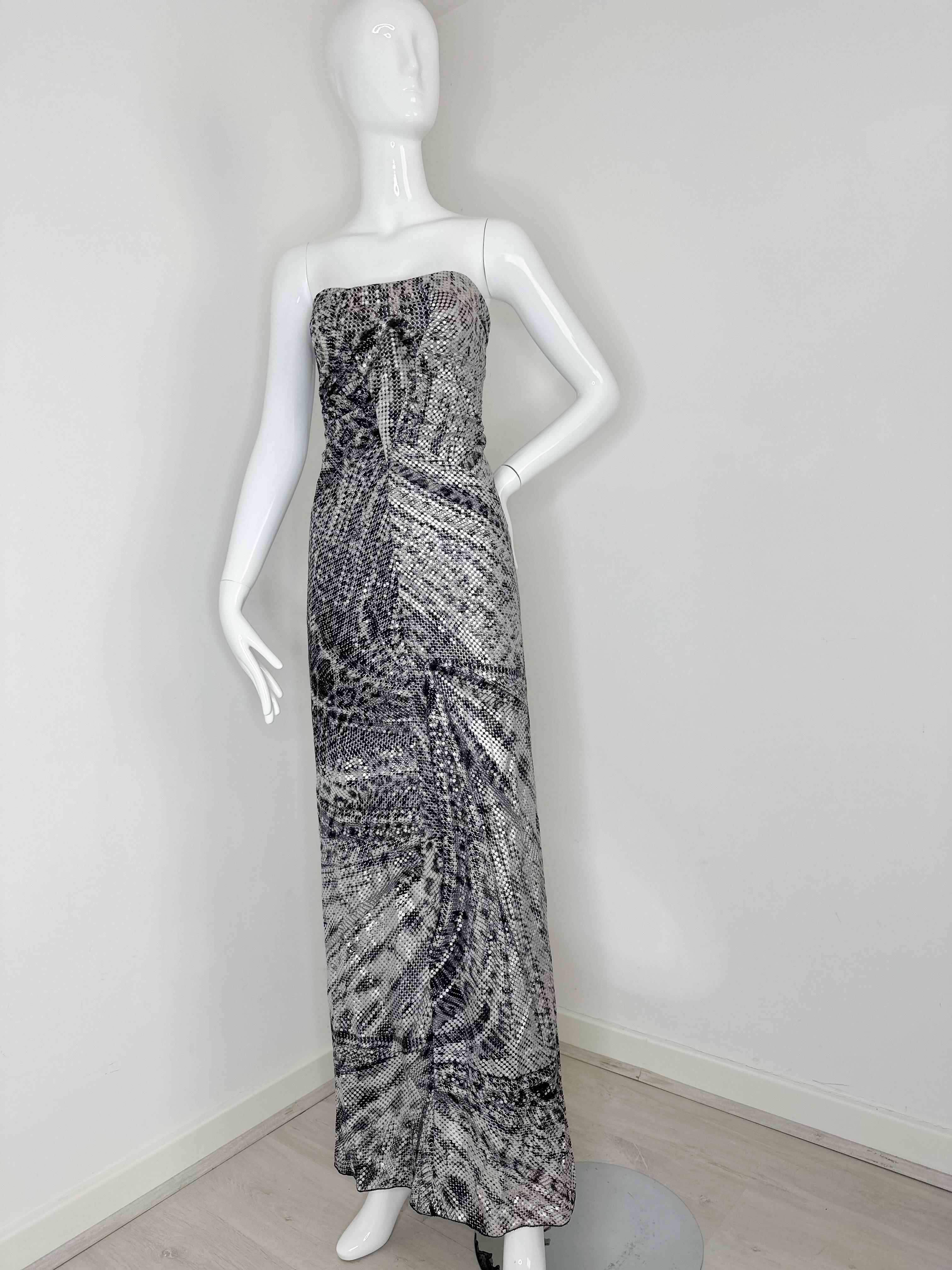 Roberto Cavalli FW 2003 silk silver gown dress 
Size S 

Printed with sparkly sequins that sine with movement.
A similar dress seen on Cindy Crawford 

Condition: good vintage condition. 

There is a little stretch to the fabric

Please ask all