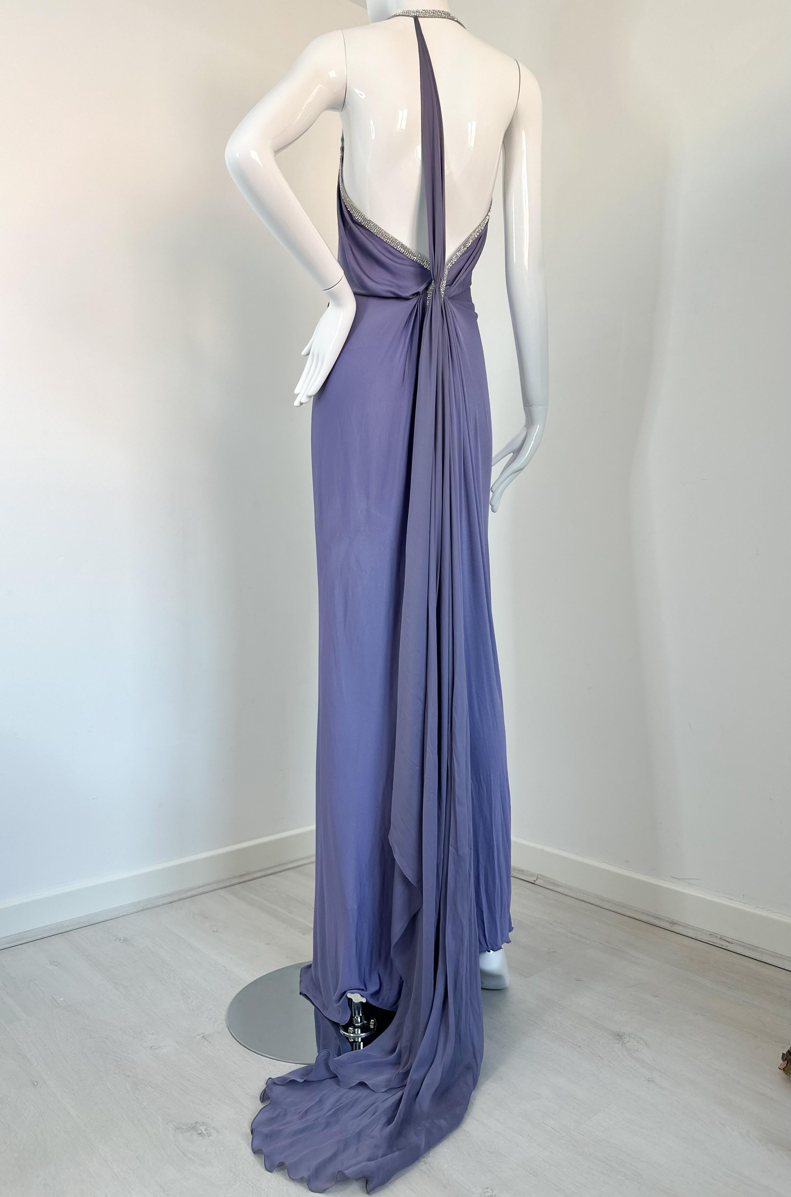 Roberto Cavalli 2004 lilac maxi gown with crystal embellishments 

Size 38 
Gorgeous, rare dress with sexy open back and silk tail that can also be wrapped around the neck

All tags on the dress are in pictures. Missing main brand tag 
Good vintage