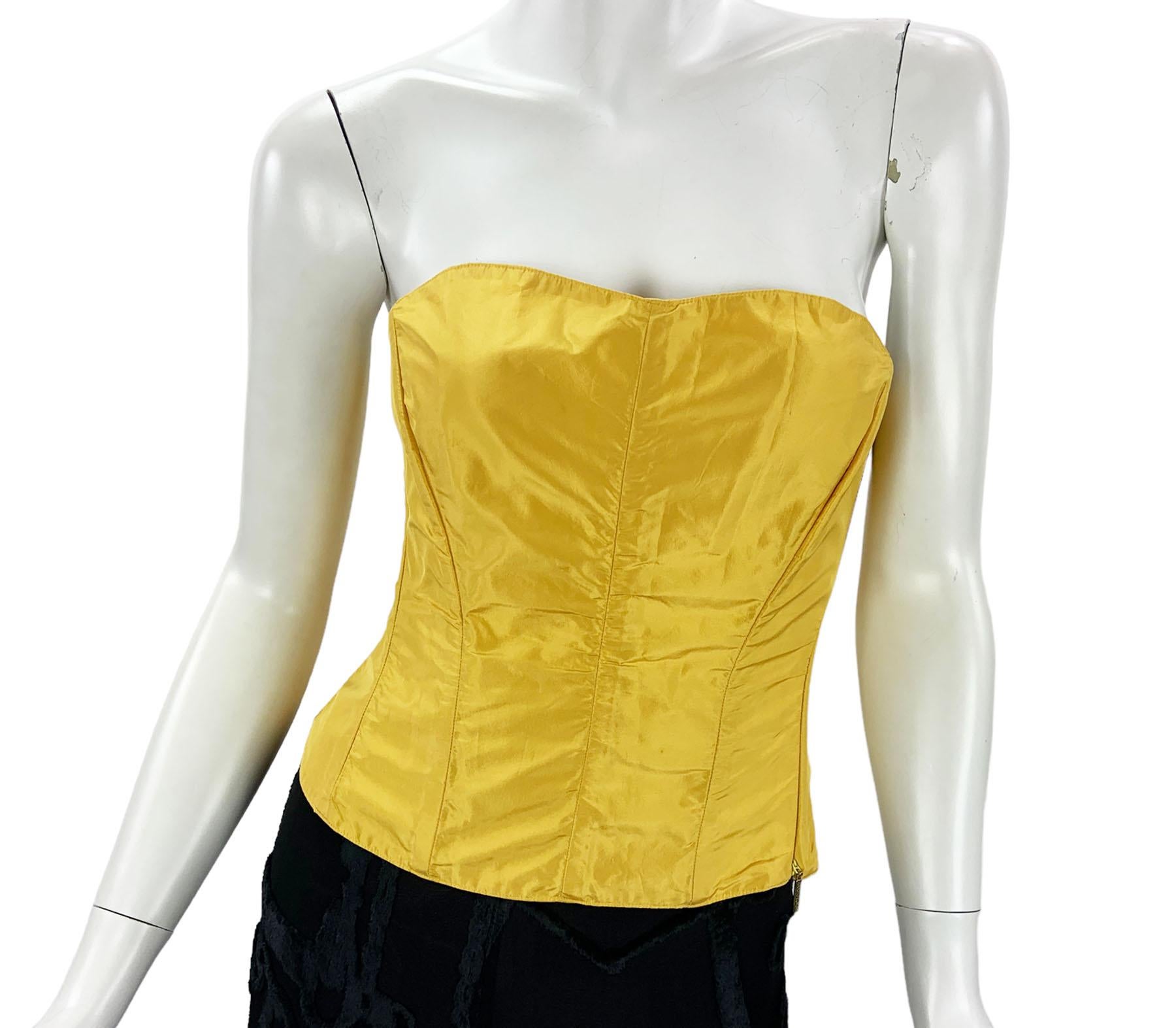 New Roberto Cavalli Corset Top
2005 Collection
Italian size - M
100% Taffeta Silk, Lace-Up, Side Zip Closure, Fully Lined in Same Silk Fabric.
Made in Italy.
New without tag.
