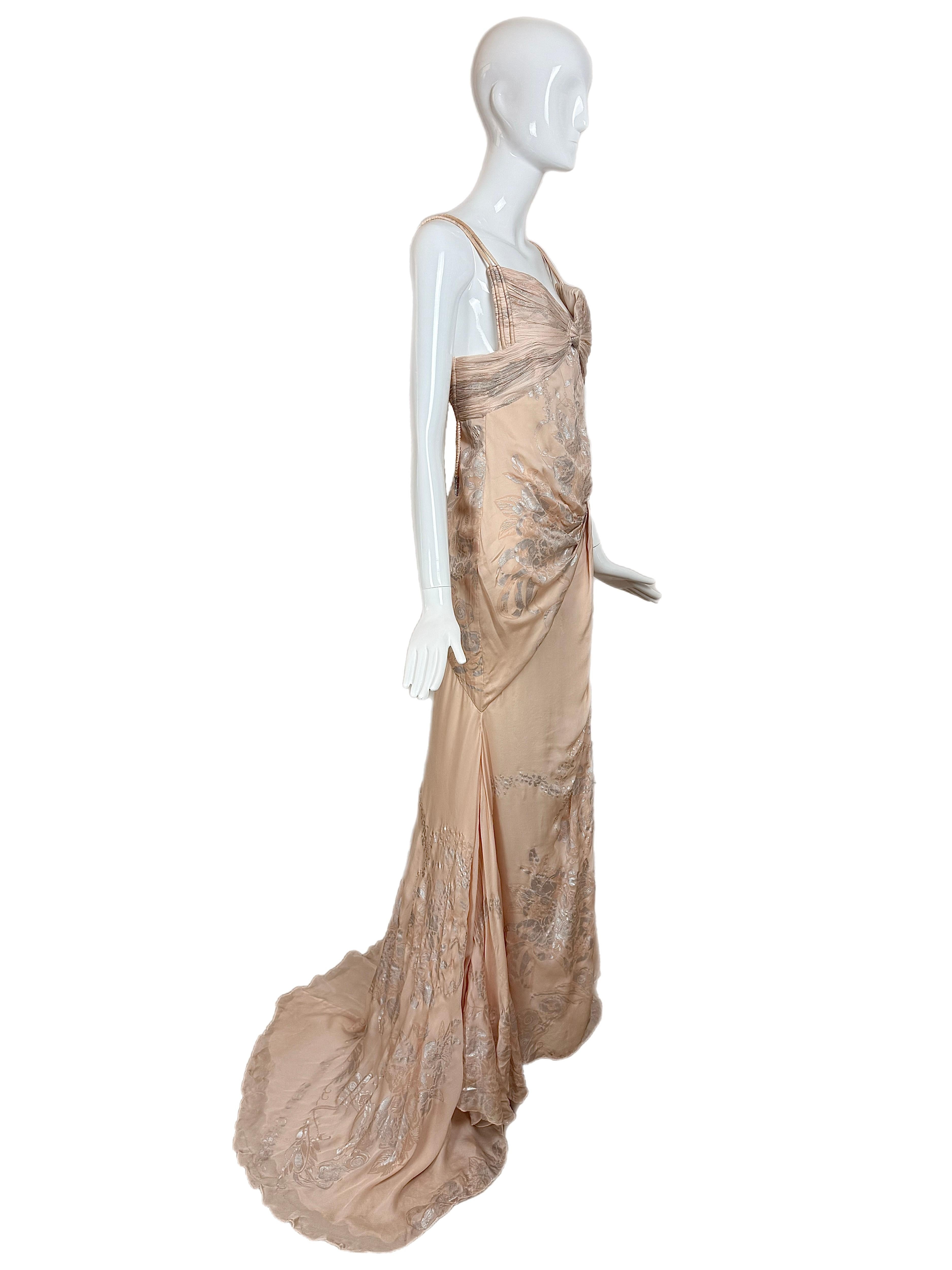 Roberto Cavalli
Vintage
'06
Peach and Silver Foil
Very dramatic
100% Silk
Hard boned corset inside with bodysuit
Crystal accents
Finger loop for train pick-up
Size IT40 fits small
Good vintage condition
Just needs a dry cleaning
Measurements in