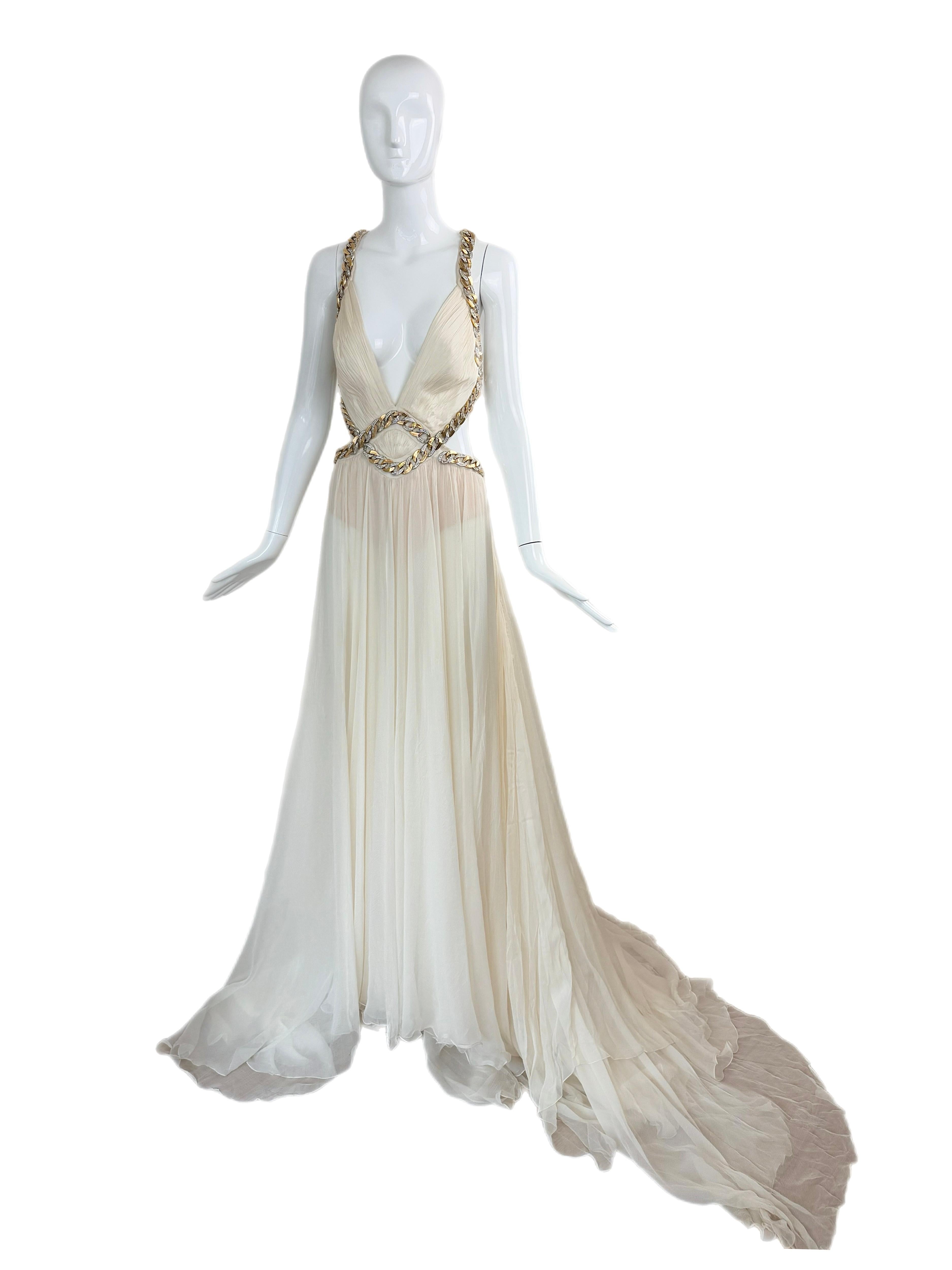 Roberto Cavalli
Vintage
SS09 menswear runway collection
Warm ivory color
Silver and yellow gold hardware with diamante crystals
Low open back
Size IT40, impossible to measure but fits true to size
Great for bridal / wedding festivities
Great vintage