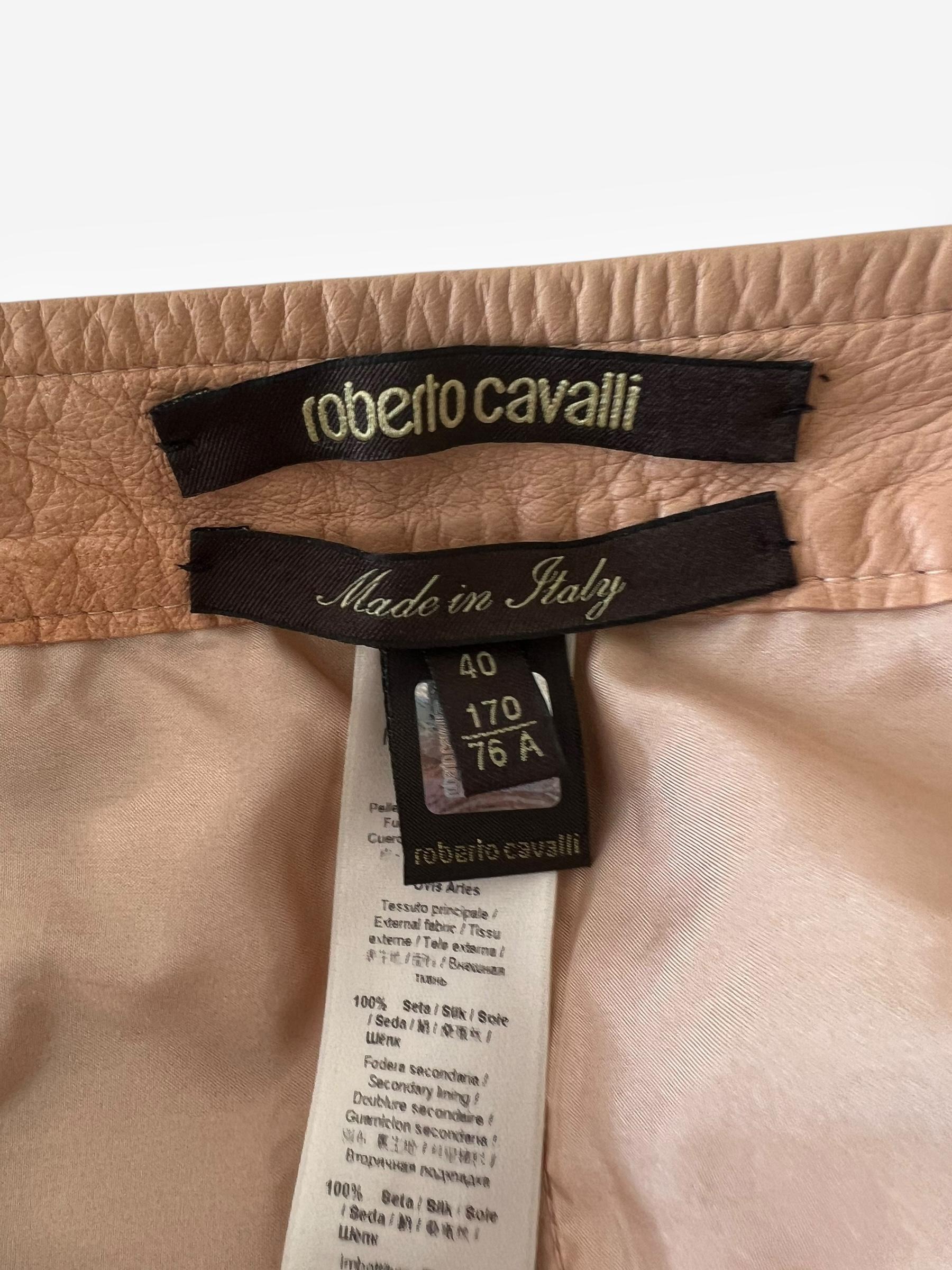 

These striking leather connected fridge pants from Roberto Cavalli’s 2013 collection exude bold glamour with their edgy design and impeccable craftsmanship. Crafted in a lovely flesh-toned nude shade, they blend daring sensuality with versatile
