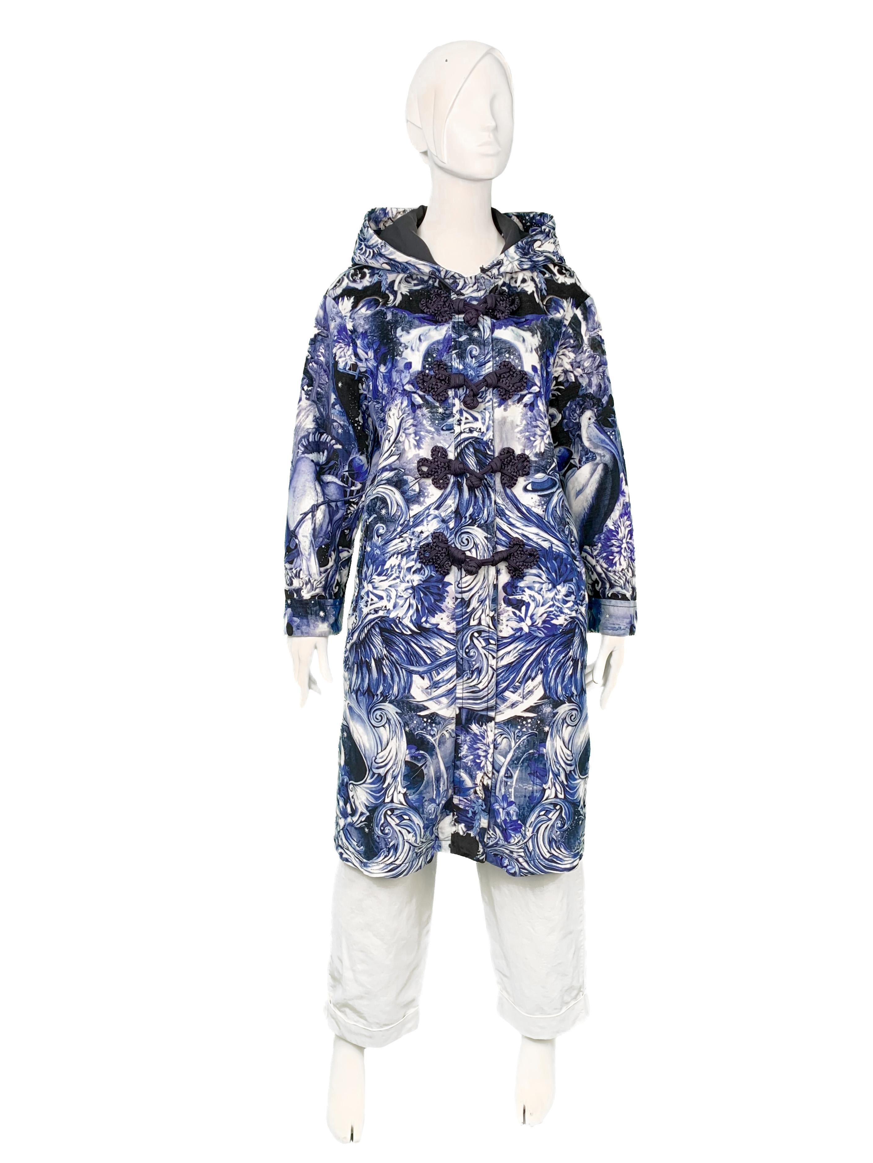 Roberto Cavalli mid-2010s velvet hooded lightweight hooded coat/jacket with a blue porcelain-inspired painterly-effect baroque print of an esoteric garden with flowers, leaves, mushrooms, exotic birds, eyes, planets, and antique statues intertwined