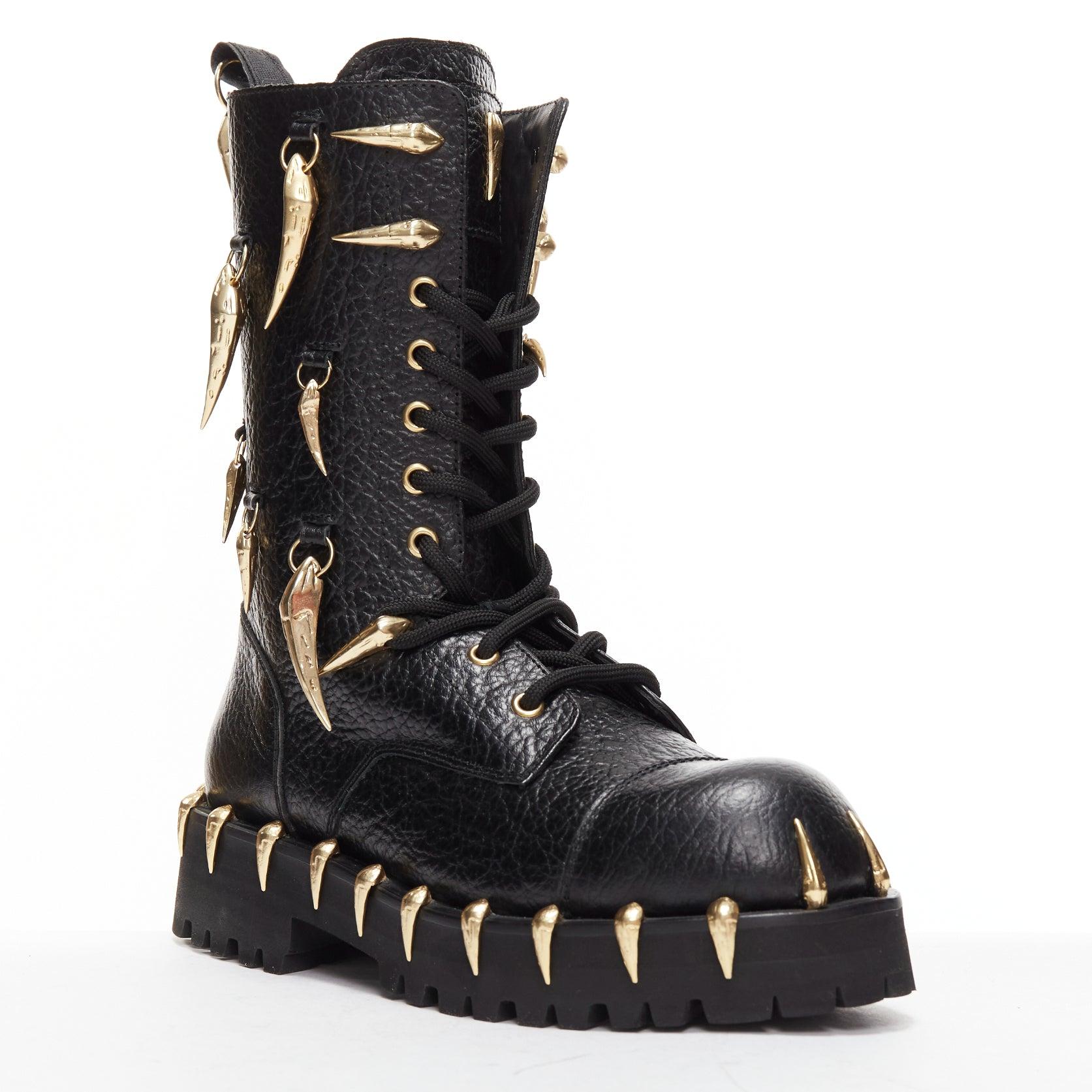 new ROBERTO CAVALLI 2022 gold horn charm embellished black leather combat boots EU39
Reference: AAWC/A00555
Brand: Roberto Cavalli
Material: Leather, Metal
Color: Black, Gold
Pattern: Solid
Closure: Lace Up
Lining: Black Leather
Extra Details: These