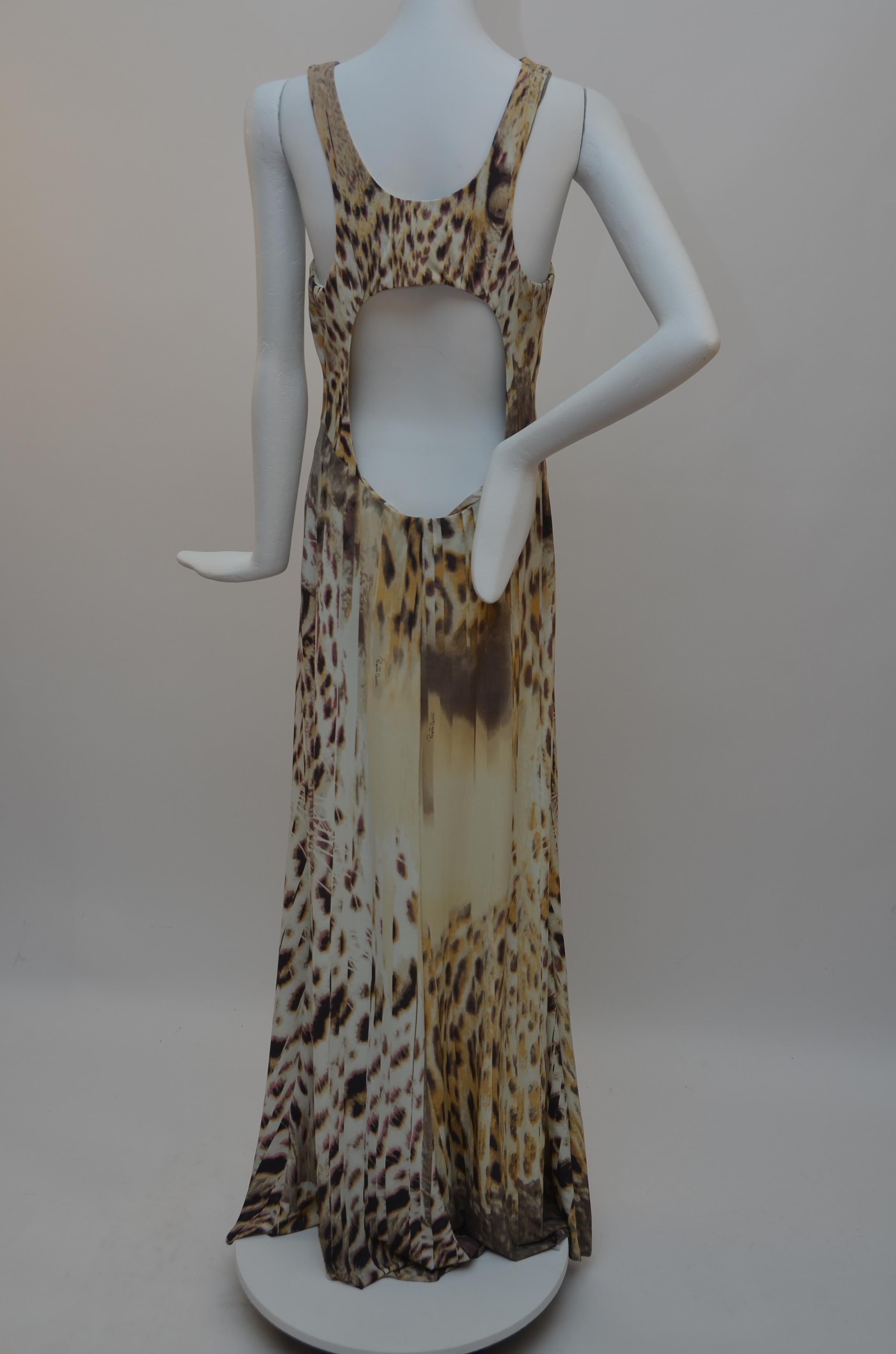 Roberto Cavalli Long  Dress
NEW with tags with few minor flaws and can be seen  on one of the picture.
Neutral colors 
Animal Print.Fabric is stretchy.
Photographed on mannequin size 2US.
Sleeveless with V-Neck

Size 42

FINAL SALE