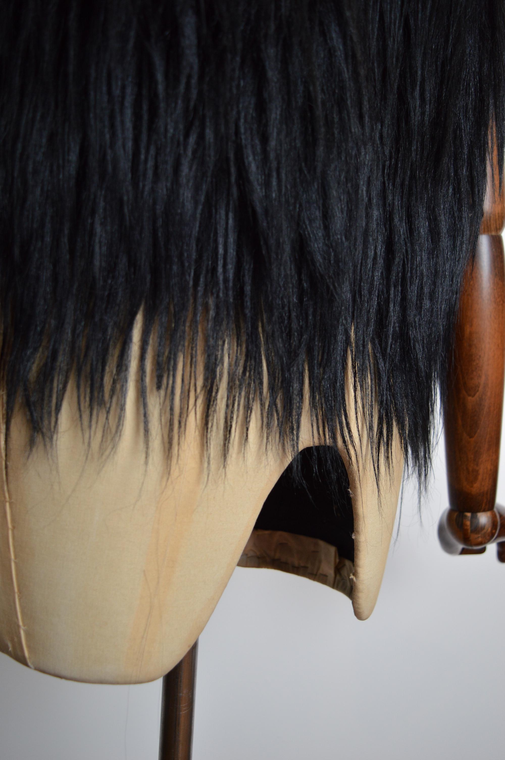 Roberto Cavalli Archival Chaleco de esquí de piel de cabra Kidassia negro y botas de nieve a juego en venta 11
