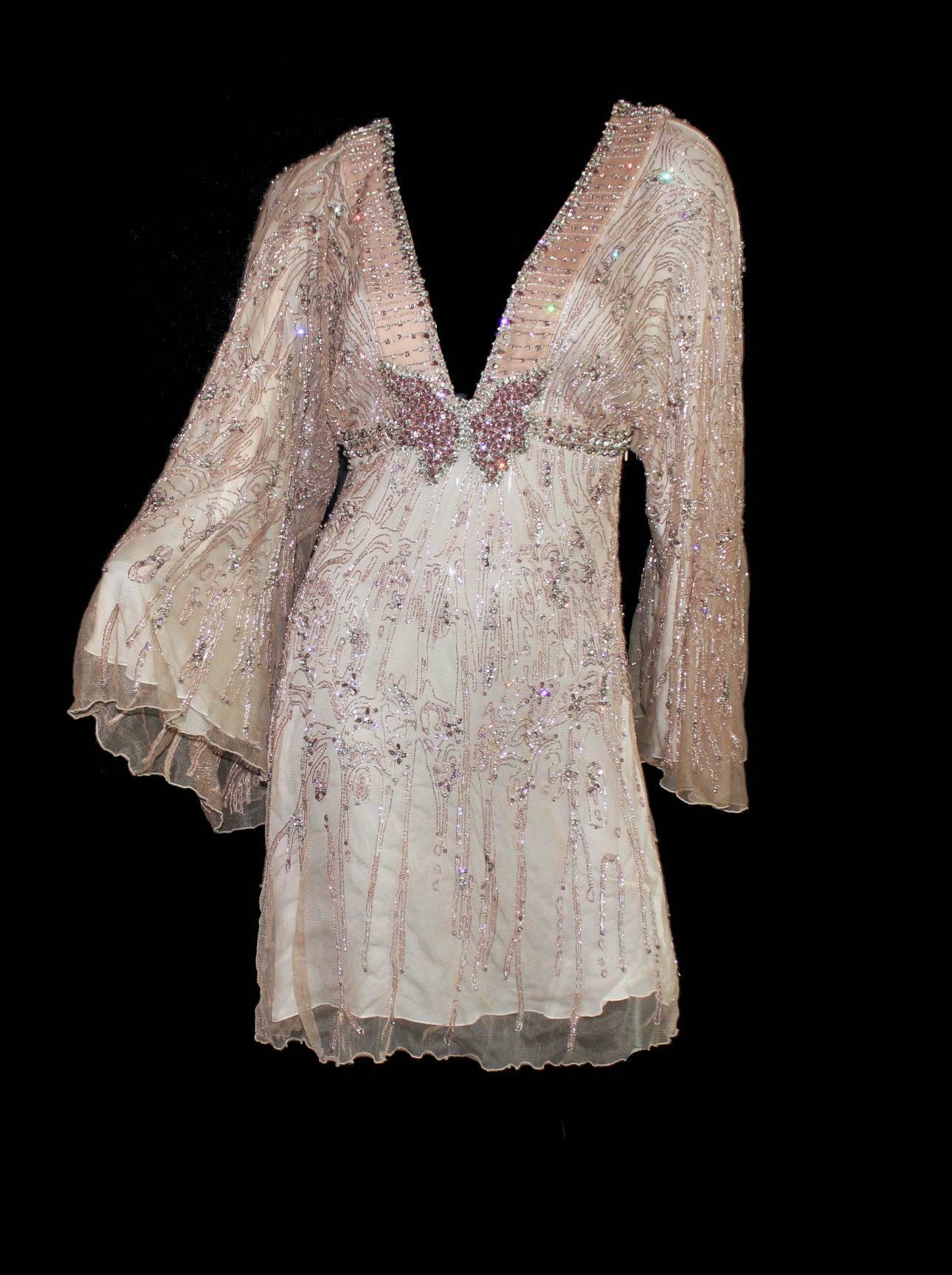 Roberto Cavalli Evening Dress
Just like haute-couture
Breathtaking hand-beading all over
Butterfly detail
Kimono-style sleeves
Finest blush silk
Open back
Made in Italy
Dry Clean Only